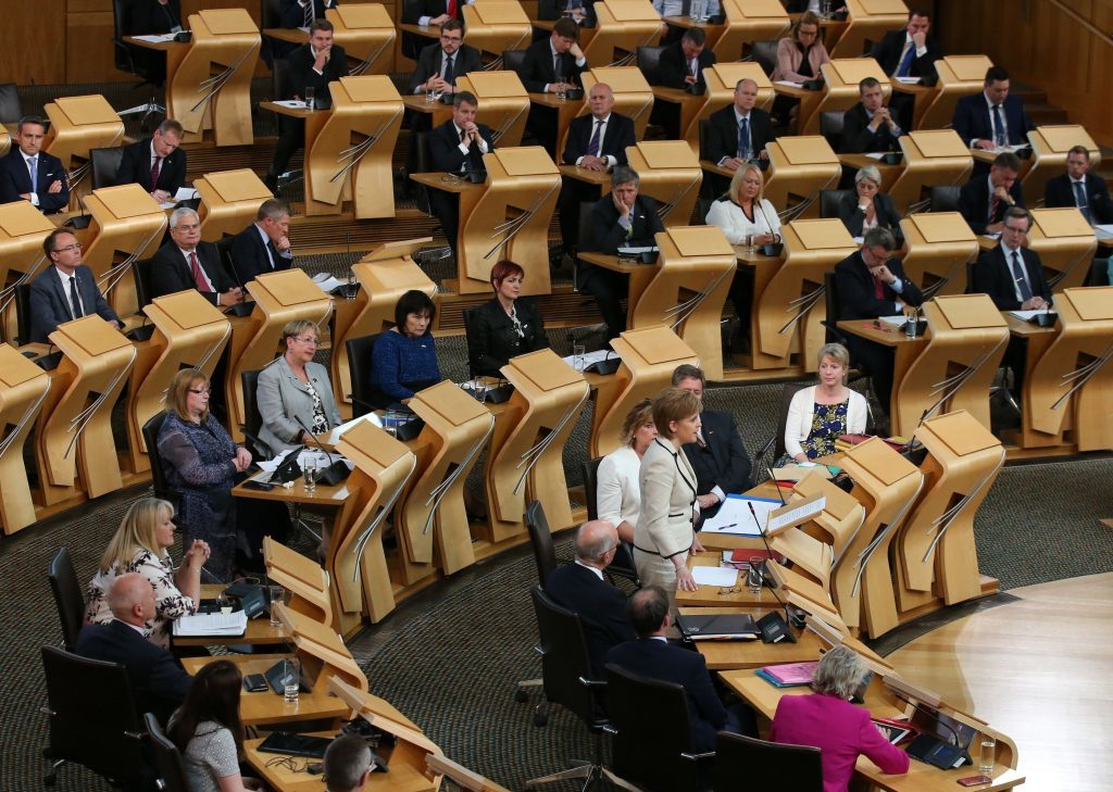 Scotland's First Minister Nicola Sturgeon making a statement on BREXIT to MSP's in the debating chamber at the Scottish Parliament in the Edinburgh. PRESS ASSOCIATION Photo. Picture date: Tuesday June 28, 2016. See PA story POLITICS EU Scotland. Photo credit should read: Andrew Milligan/PA Wire