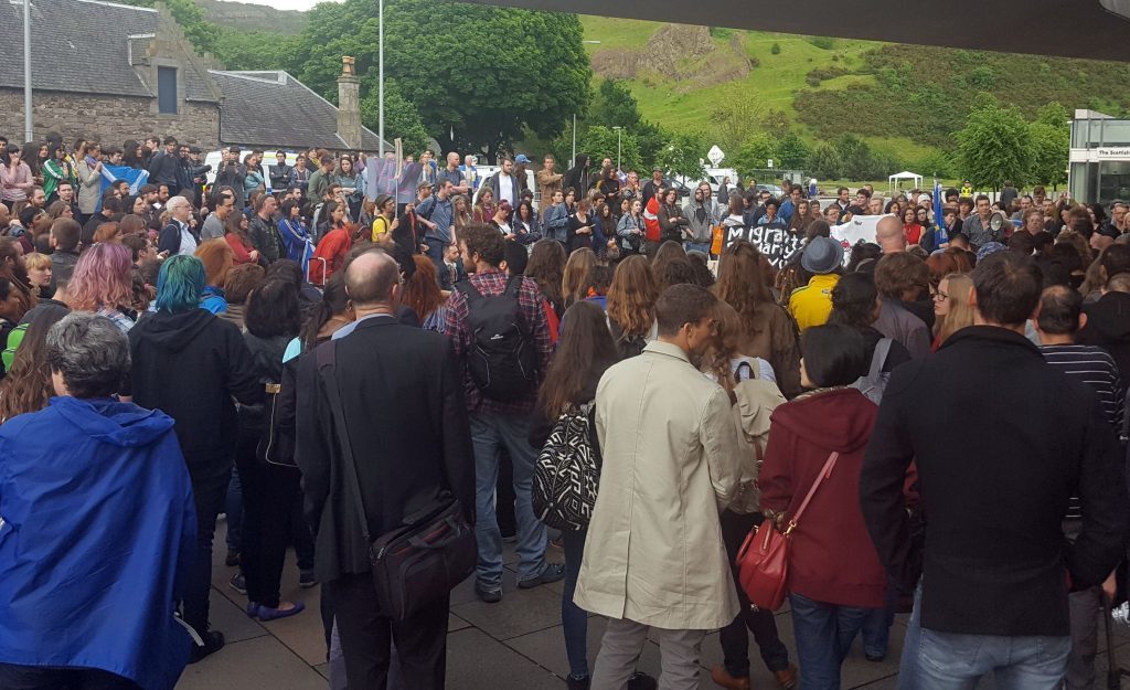 Protesters gathered outside the Scottish Parliament in Edinburgh on Friday night after the Brexit vote.