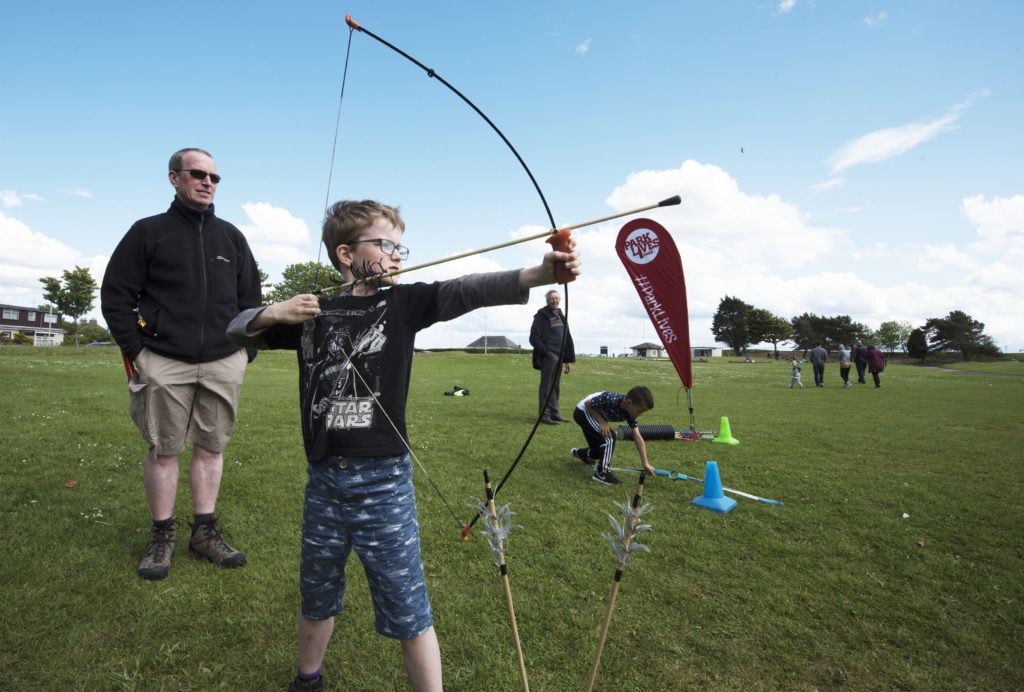 Benjamin Glancey and his dad Michael enjoy archery via ParkLives. 