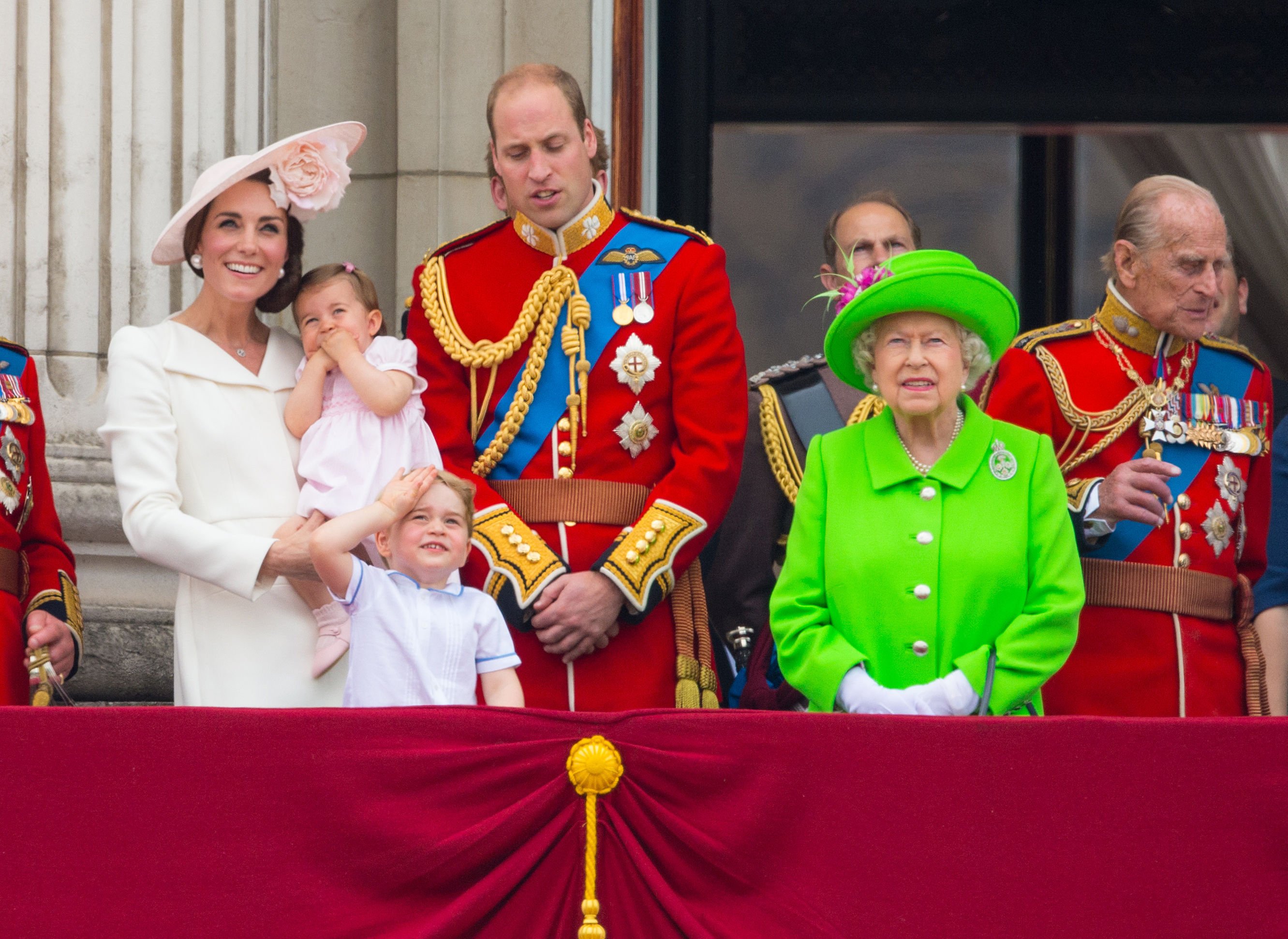 From left: The Duchess of Cambridge, Princess Charlotte, Prince George, the Duke of Cambridge, the Queen  and the Duke of Edinburgh watch a flypast from the balcony of Buckingham Palace, in central London following the Trooping the Colour ceremony at Horse Guards Parade.