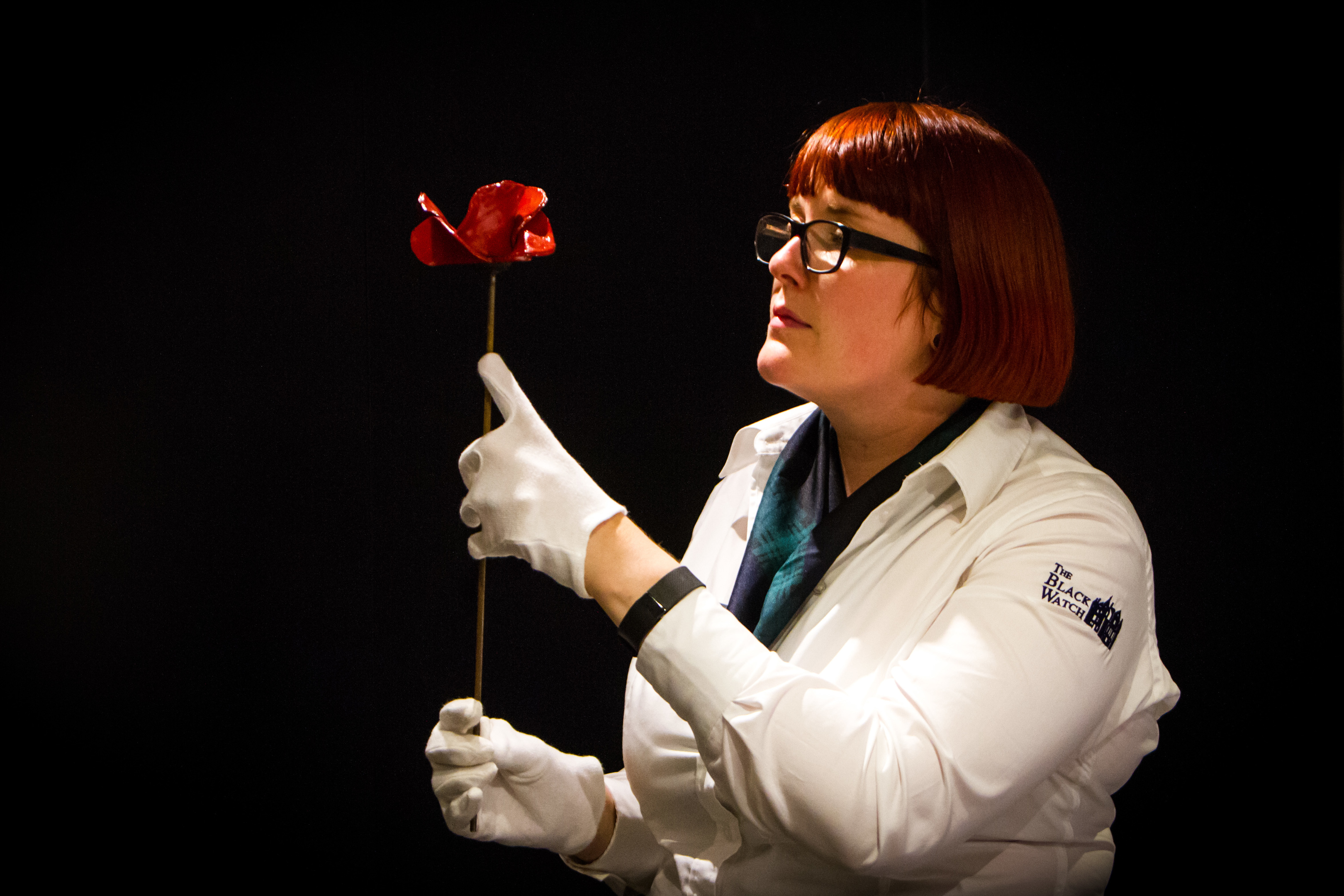 Black Watch museum manager Emma Halford-Forbes, with one of the ceramic poppies. This particular poppy has been gifted to the museum and will go on permanent display at the castle.