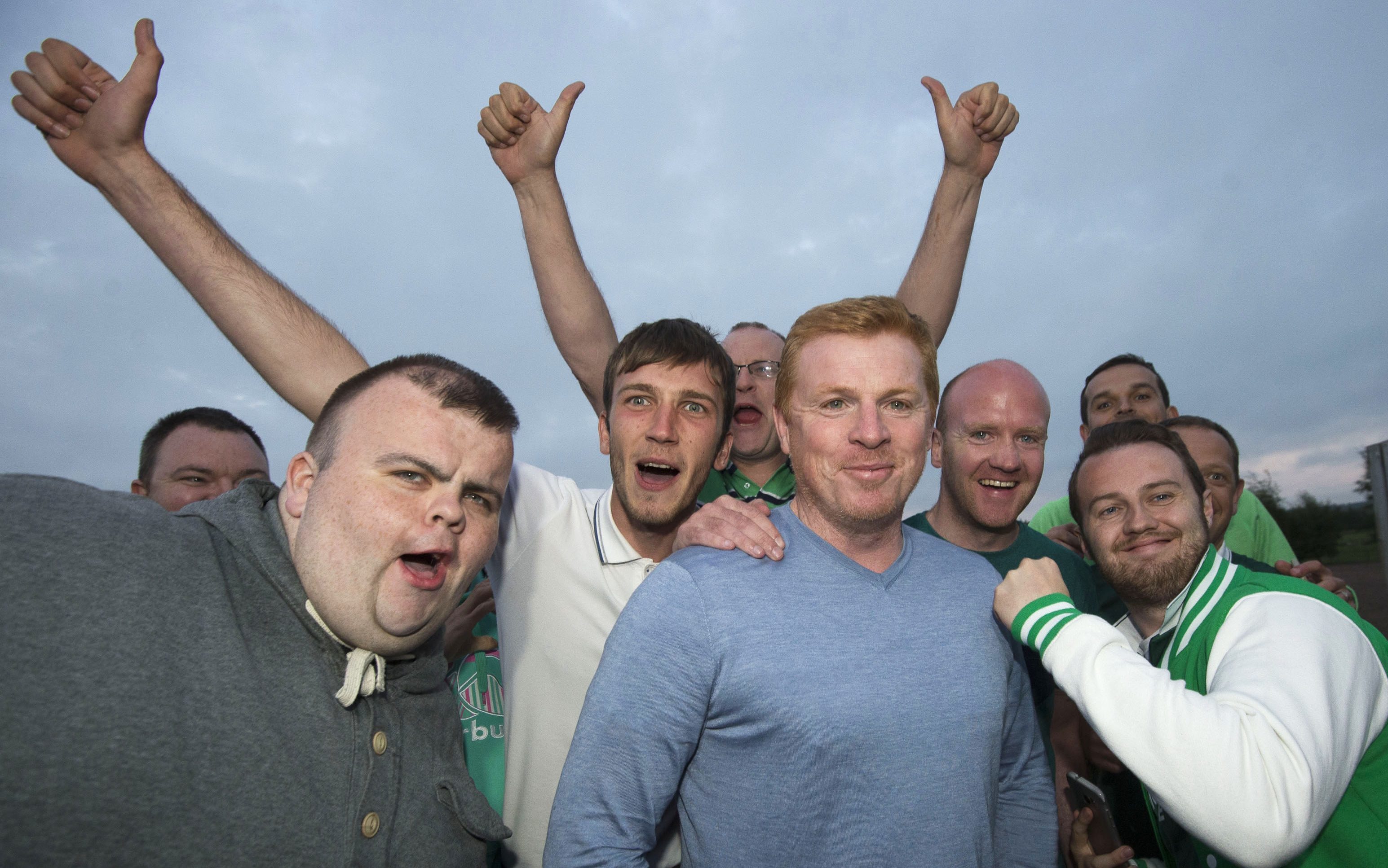 Neil Lennon, pictured with Hibs fans, has not always enjoyed good times.