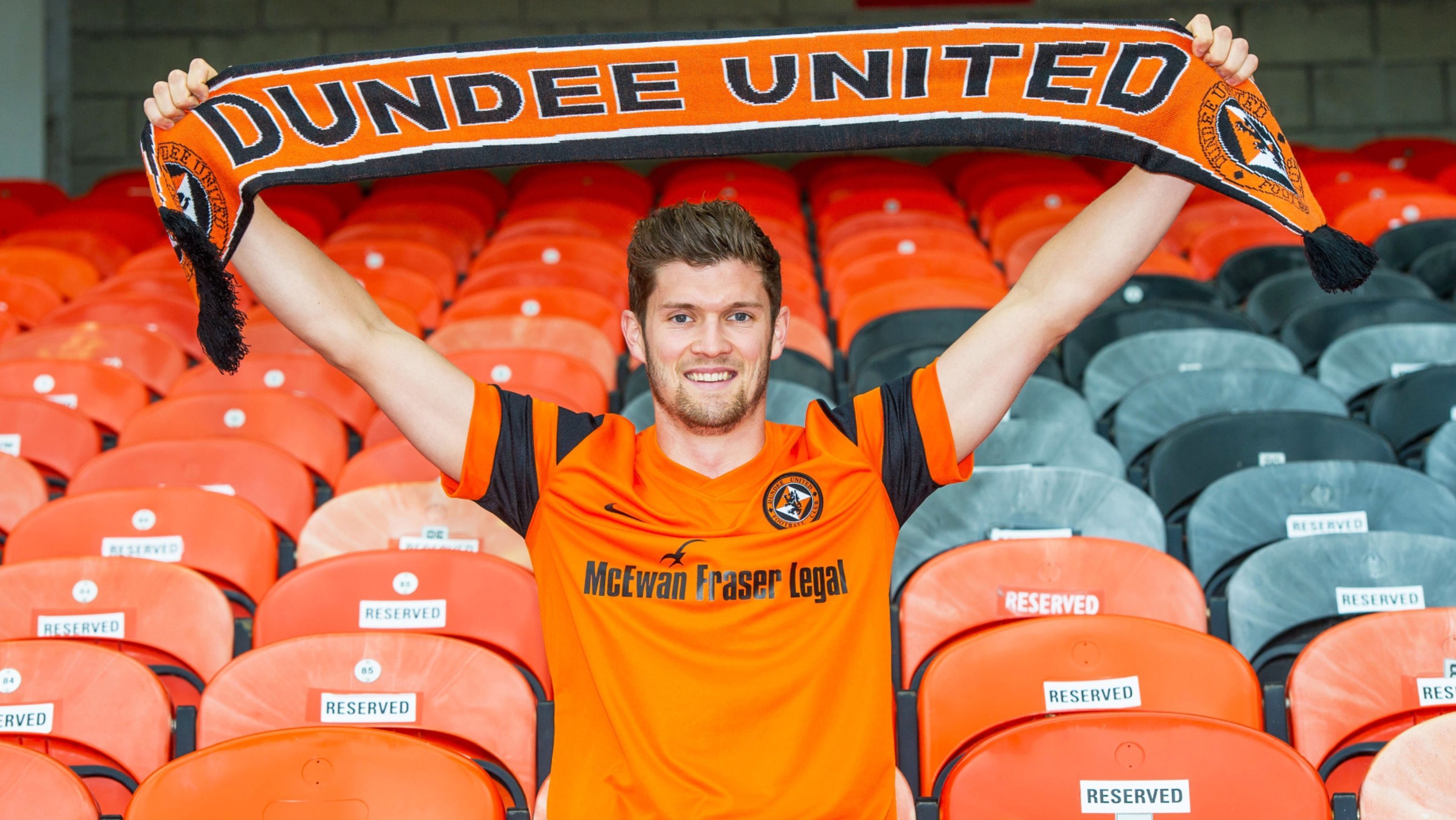 Stewart Murdoch shows off his new colours at Tannadice.