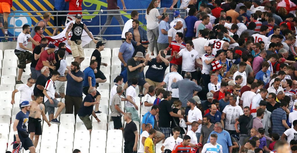 Tempers flare between rival fans in the stands during the UEFA Euro 2016, Group B match at the Stade Velodrome, Marseille. PRESS ASSOCIATION Photo. Picture date: Saturday June 11, 2016. Russia are facing serious UEFA sanctions after their fans appeared to attack England supporters at the end of Saturday's Euro 2016 clash. See PA story SOCCER England Fans. Photo credit should read: Owen Humphreys/PA Wire. RESTRICTIONS: Use subject to restrictions. Editorial use only. Book and magazine sales permitted providing not solely devoted to any one team/player/match. No commercial use. Call +44 (0)1158 447447 for further information.