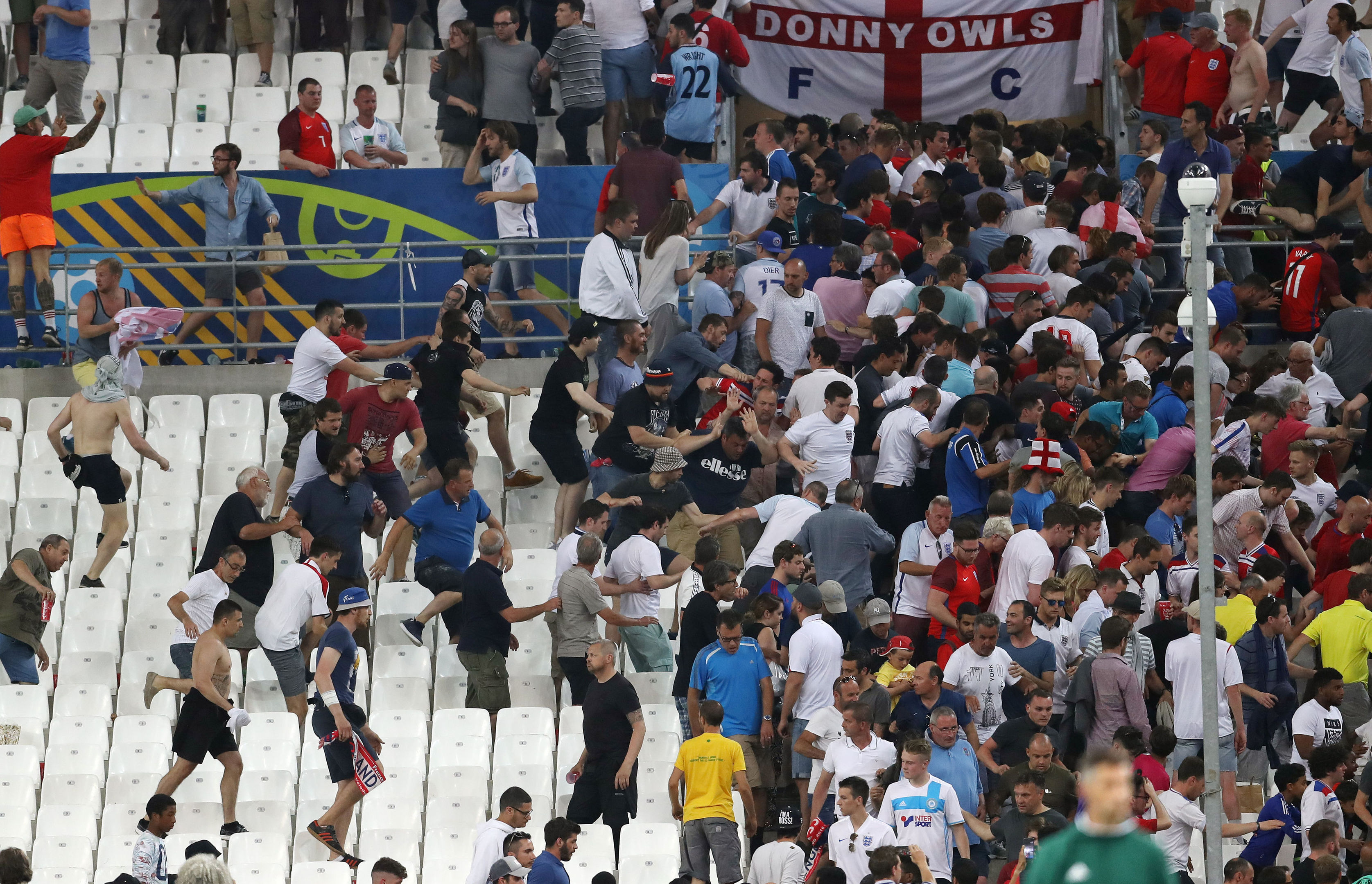 Tempers flare in the stands between Russia and England fans during their Euro 2016 match.