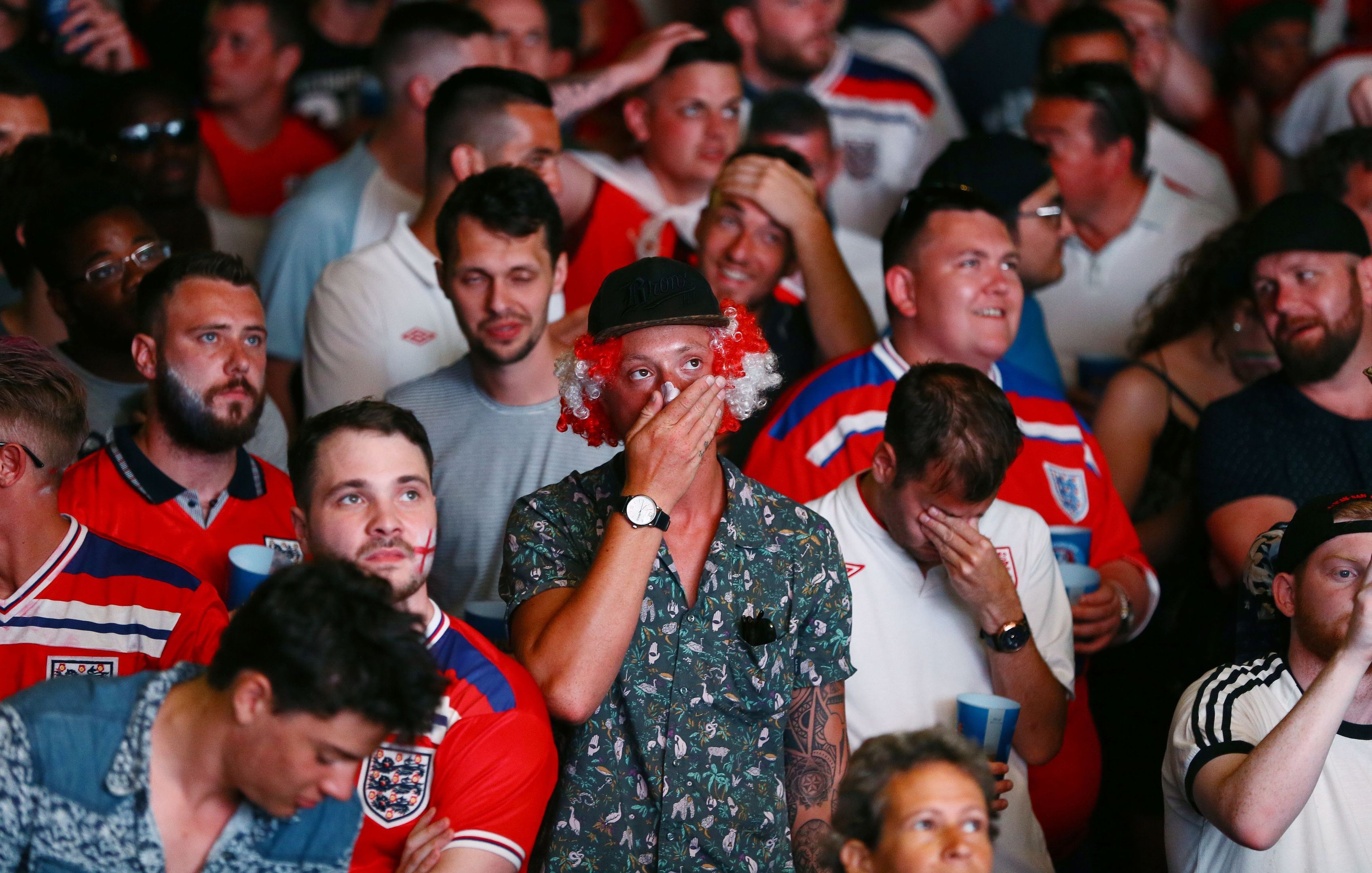 England fans react in the fan zone in Nice. 