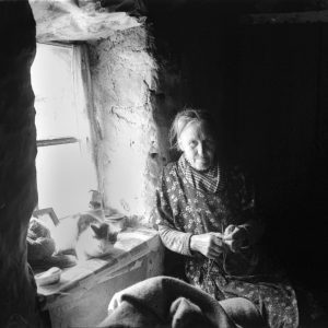 Woman in window, Harris, 1937. By Robert Moyes Adam.