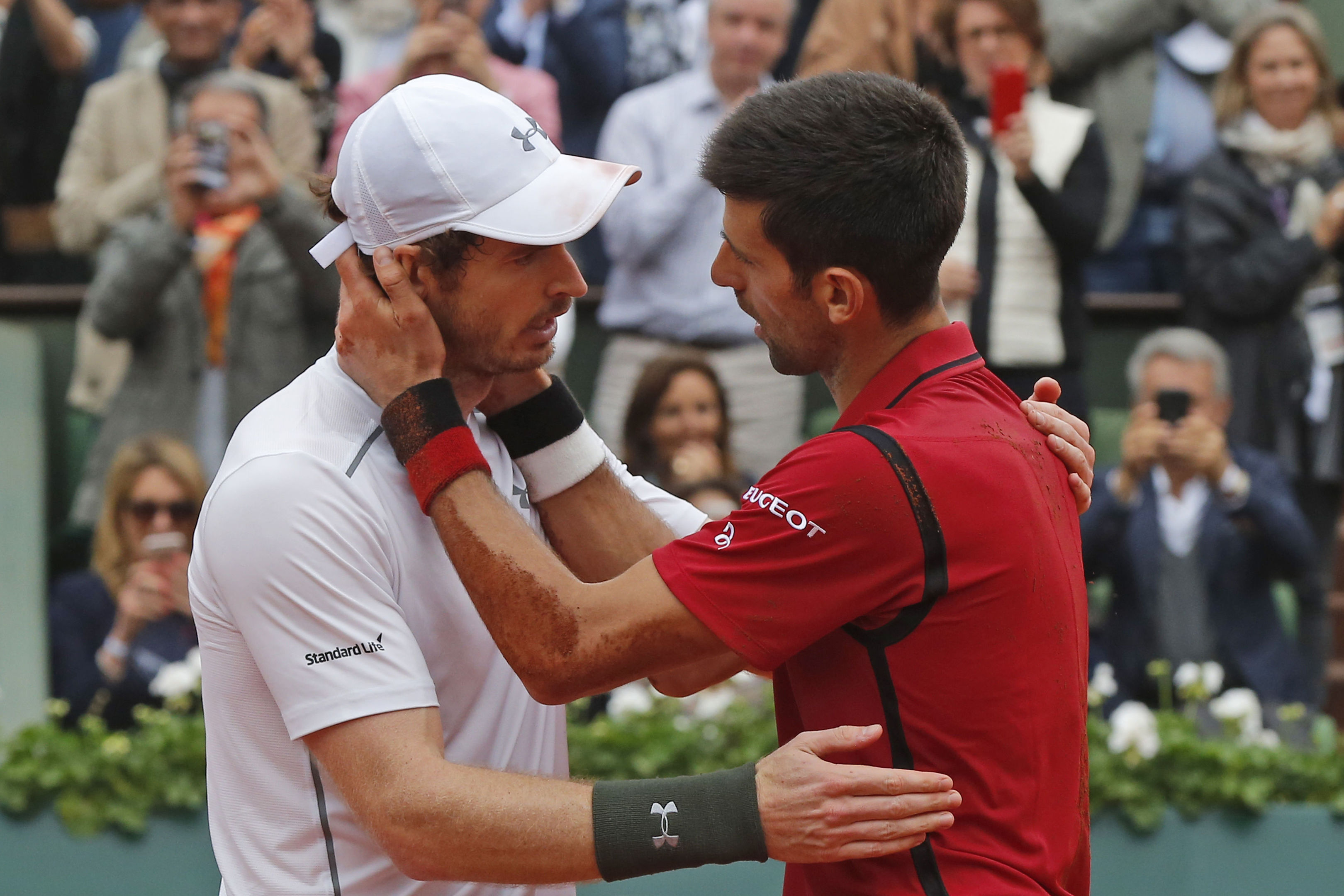 Andy Murray congratulates Novak Djokovic on achieving the career grand slam.