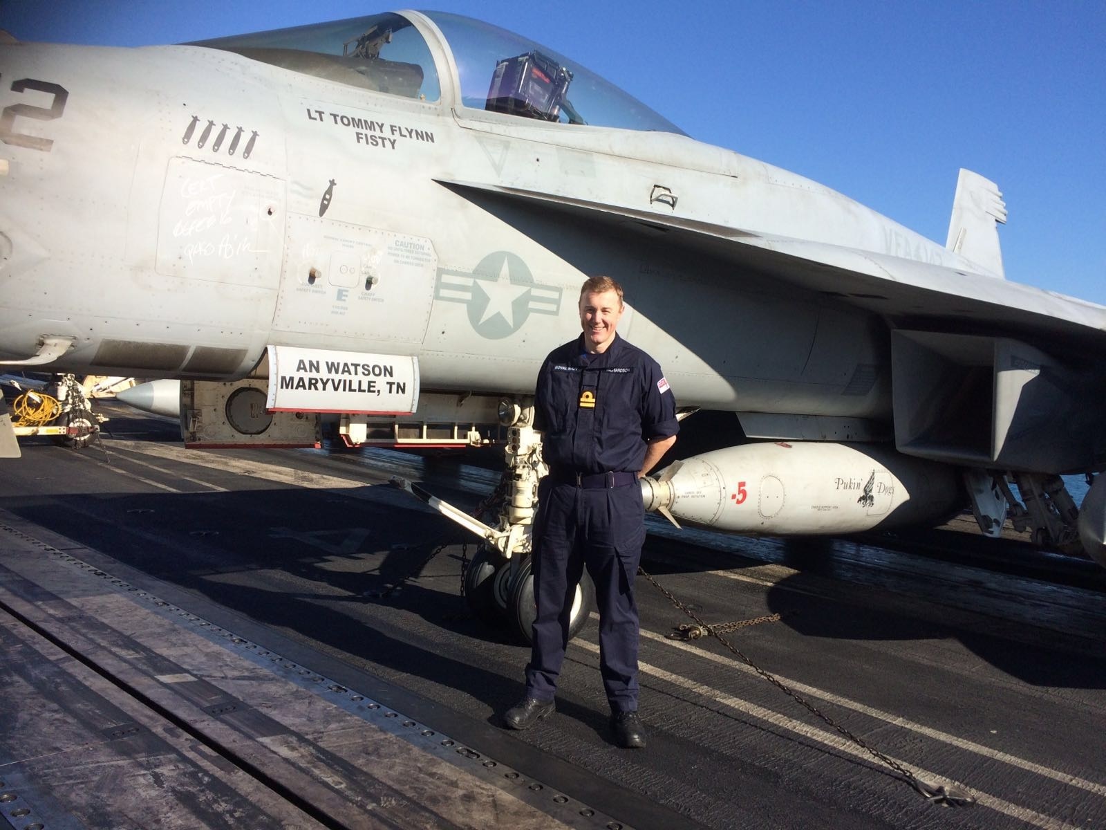 Sub-Lieutenant Barry Richardson on the flight deck of the USS Harry S Truman