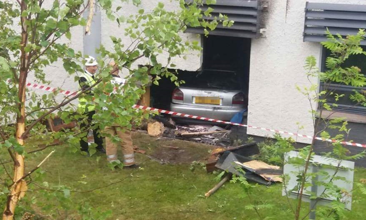 The Audi embedded in the wall of St Andrews Community Hospital.