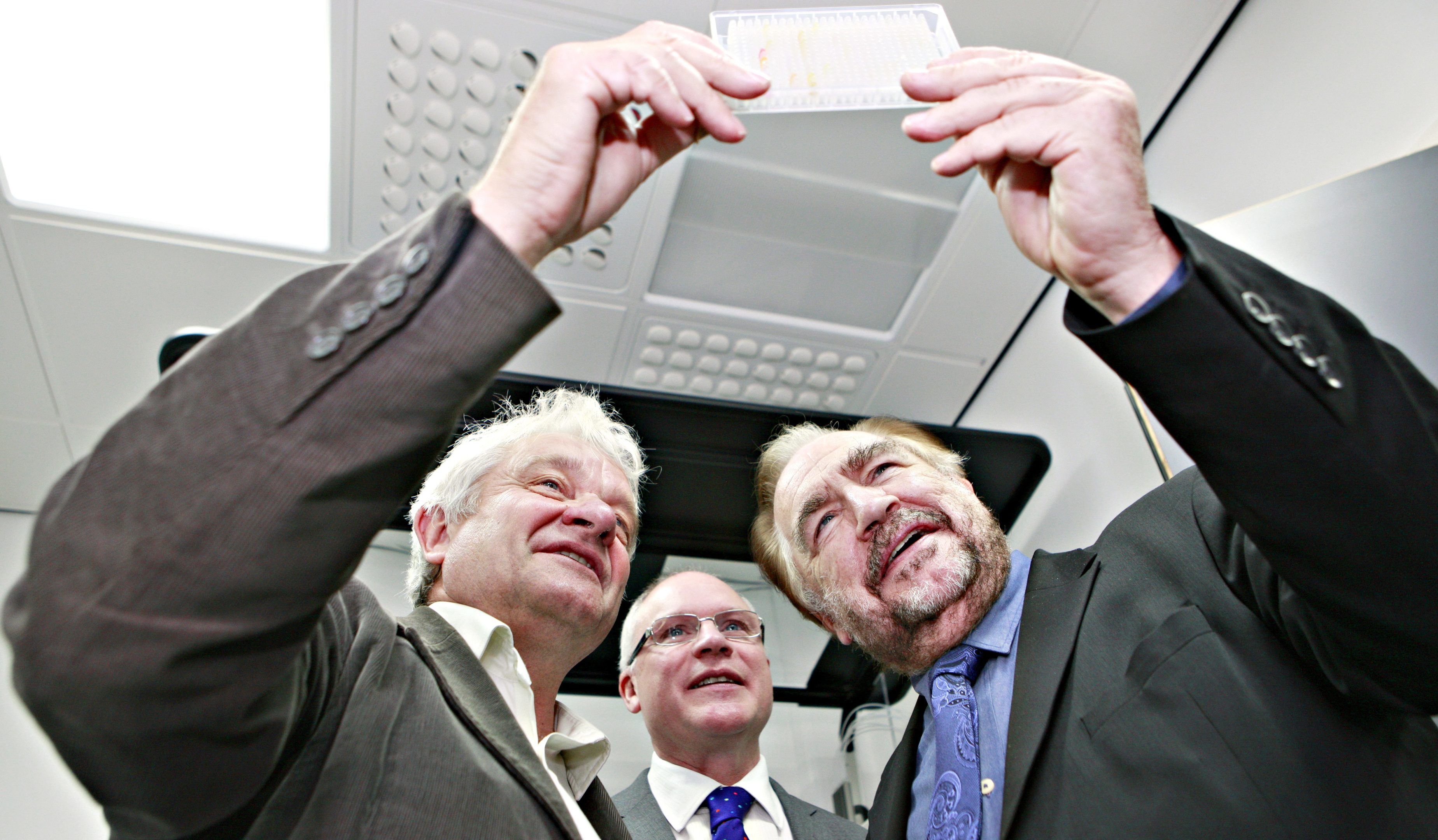 Sir Paul Nurse (left) on a visit to Dundee University in 2014, where he met Professor Mike Ferguson and then rector Brian Cox.