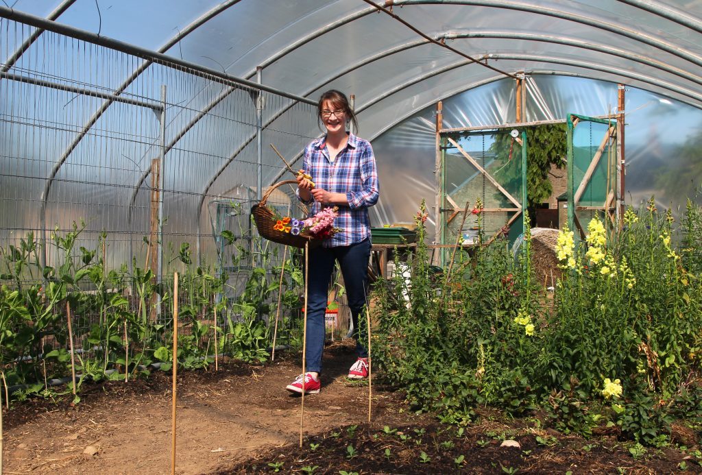 Kelly at work in her poly tunnel