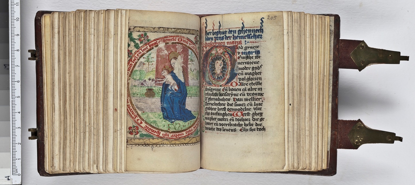 Hand-painted depiction of Virgin and Child pasted into a manuscript.