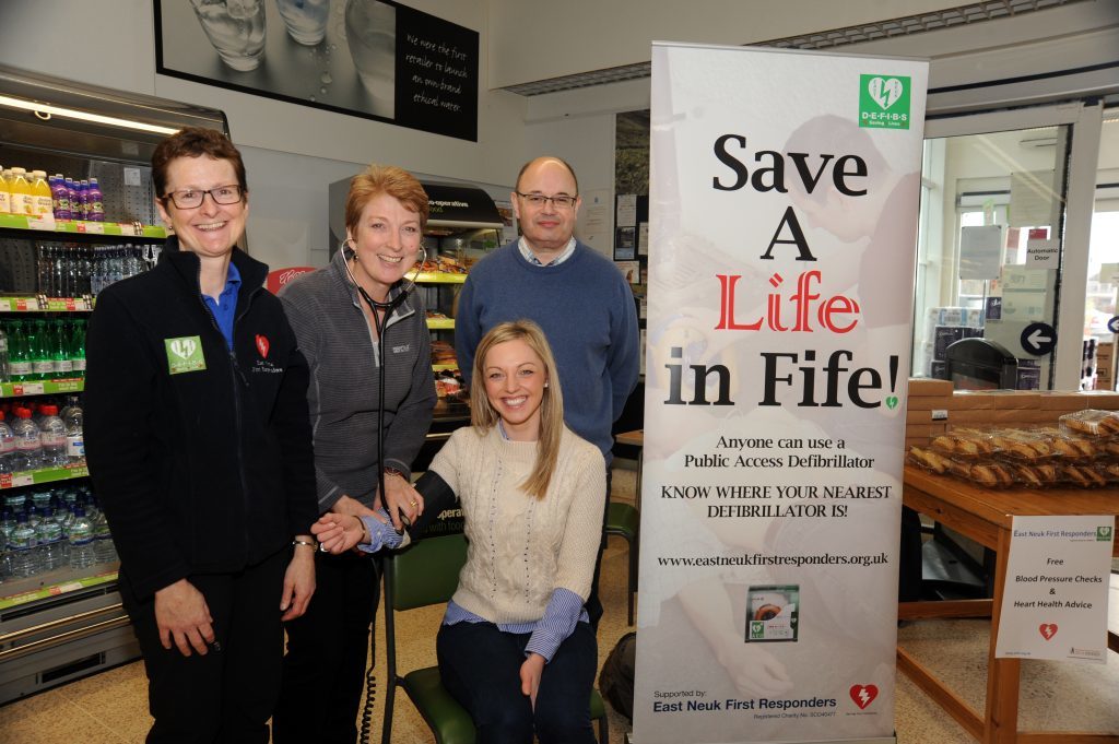 East Neuk First Responders were in the foyer at the Co-op Anstruther last February promoting Health Awareness, carrying out free blood pressure and heart risk checks along with Public Access Defibrillator awareness. From left - Gillian Duncan, Moira Mukherjee, Lyndsey Melville and Dr David Hall.