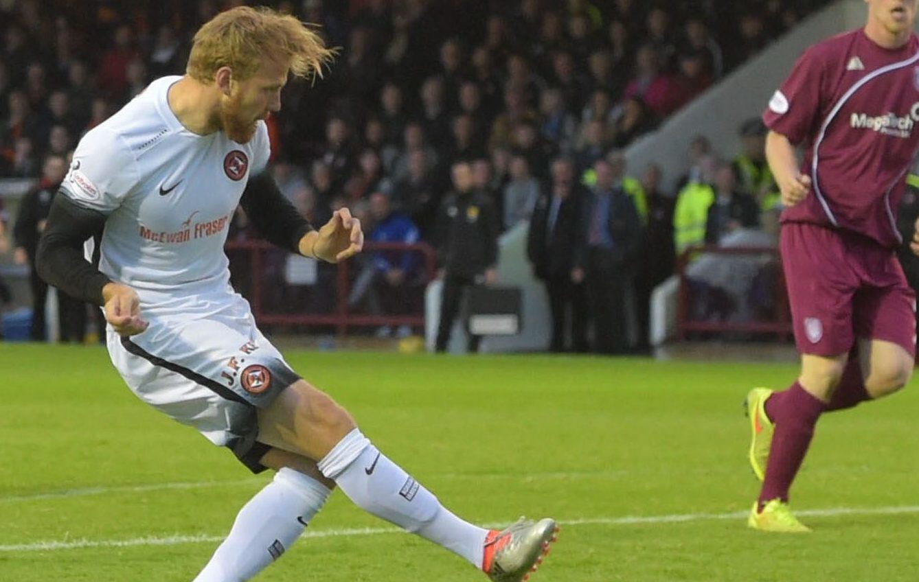 Dundee United's Henri Anier scores the first goal of the match.