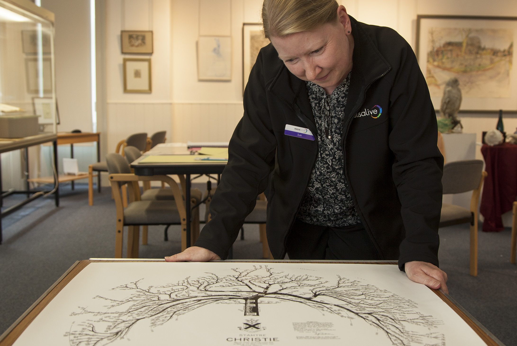 Museum assistant Sue Hampson with the Christies family tree