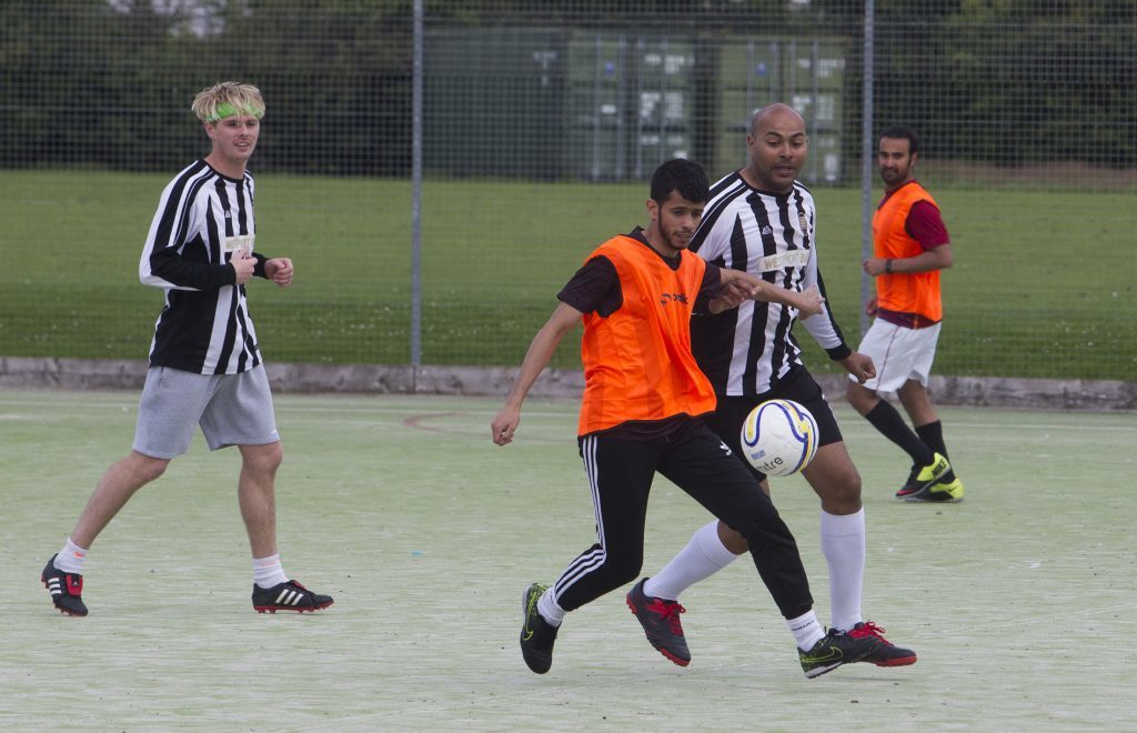 Arbroath sports centre, Syrian families take part in footy game