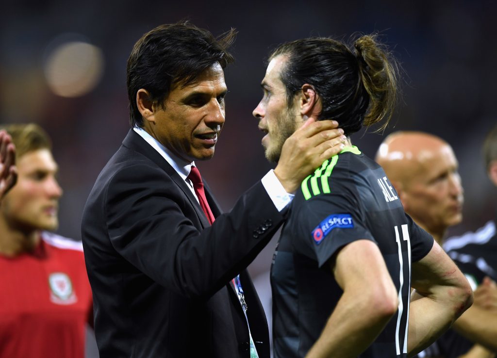 LYON, FRANCE - JULY 06:  Chris Coleman manager of Wales consoles Gareth Bale of Wales after defeat in the UEFA EURO 2016 semi final match between Portugal and Wales at Stade des Lumieres on July 6, 2016 in Lyon, France.  (Photo by Mike Hewitt/Getty Images)