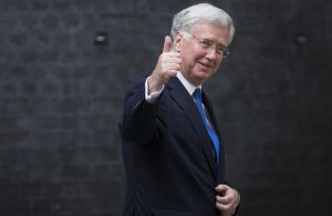 Newly appointed Defence Secretary Michael Fallon gives a thumbs up.