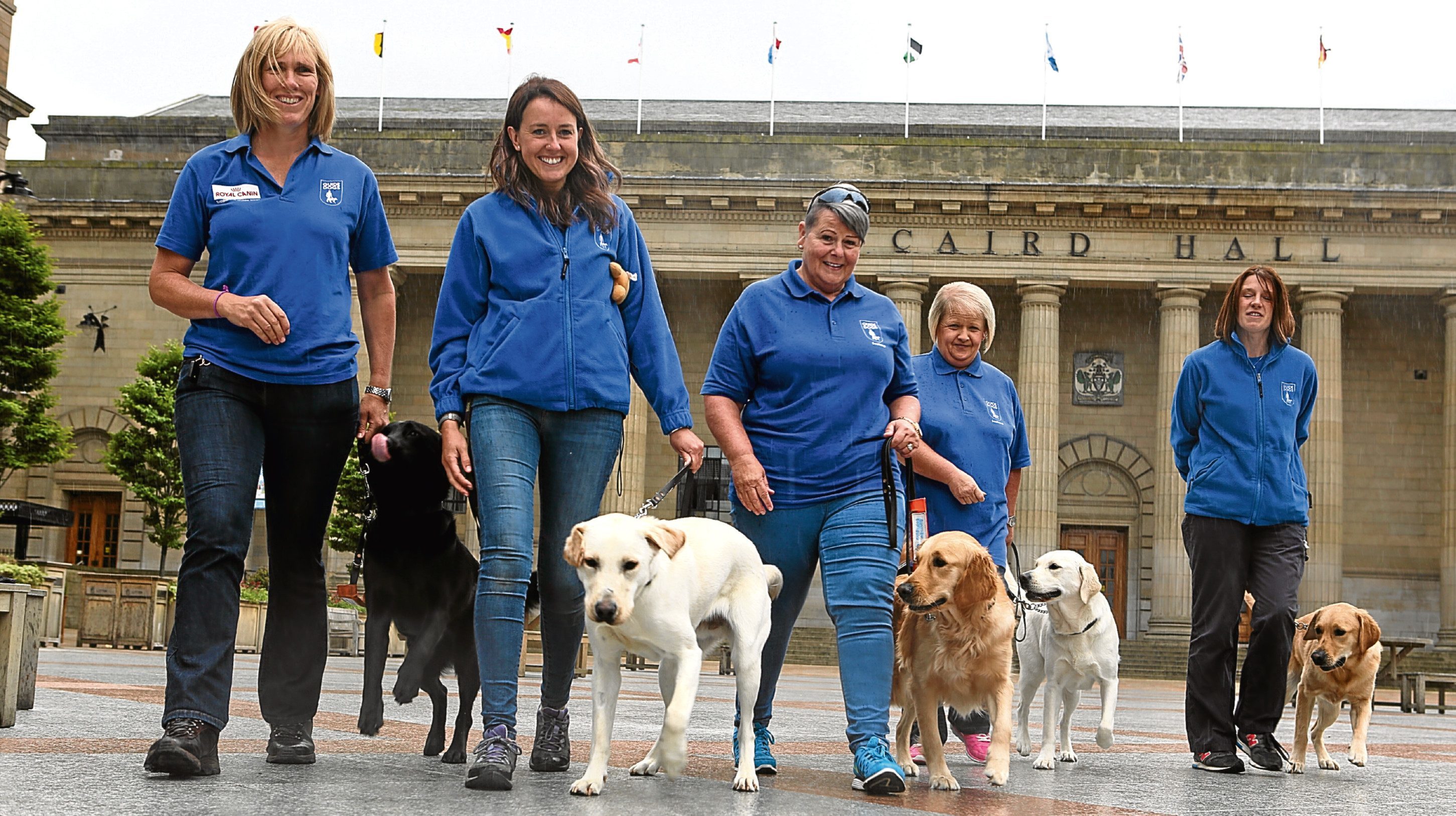 Guide dog trainers and dogs Lorna Cameron and Rowena,  Amy Griffin and Solly, Gail Simpson and Kayla, Liz Angus and Liz and Sally McCulloch and Quin.