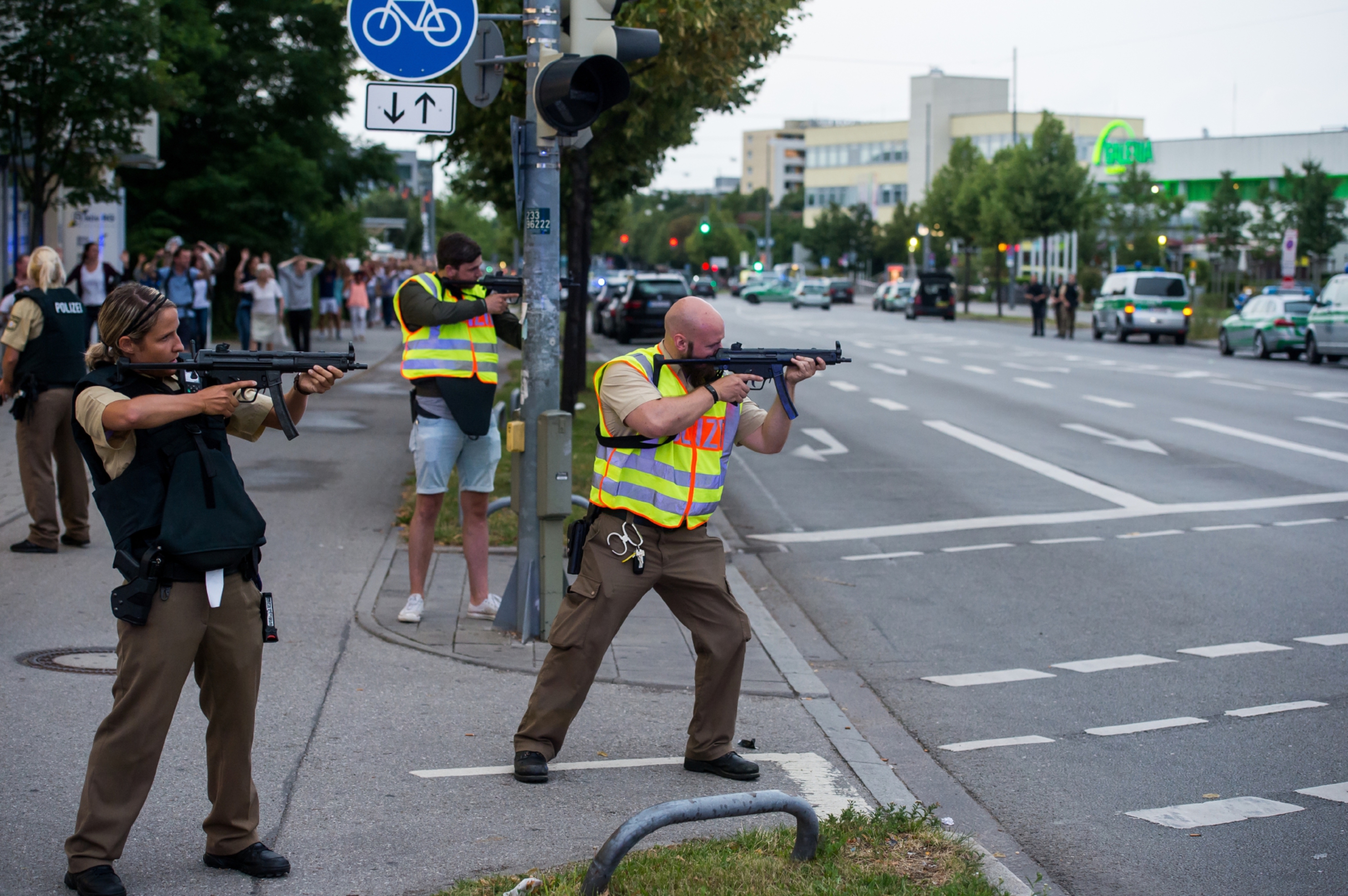 Police guard civilians after shooting in Munich