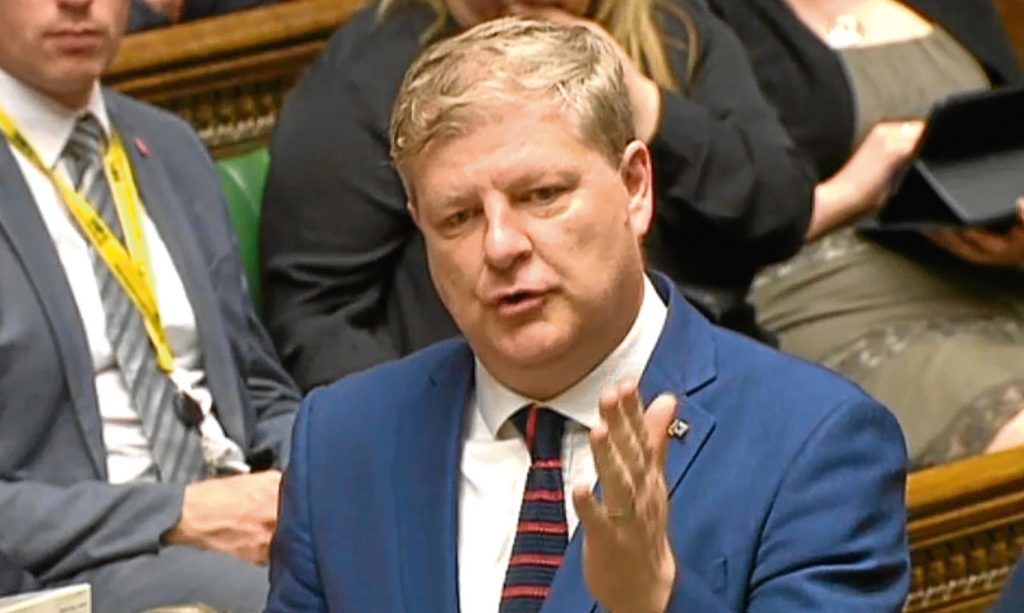 Angus Robertson in action during Prime Ministers Questions 