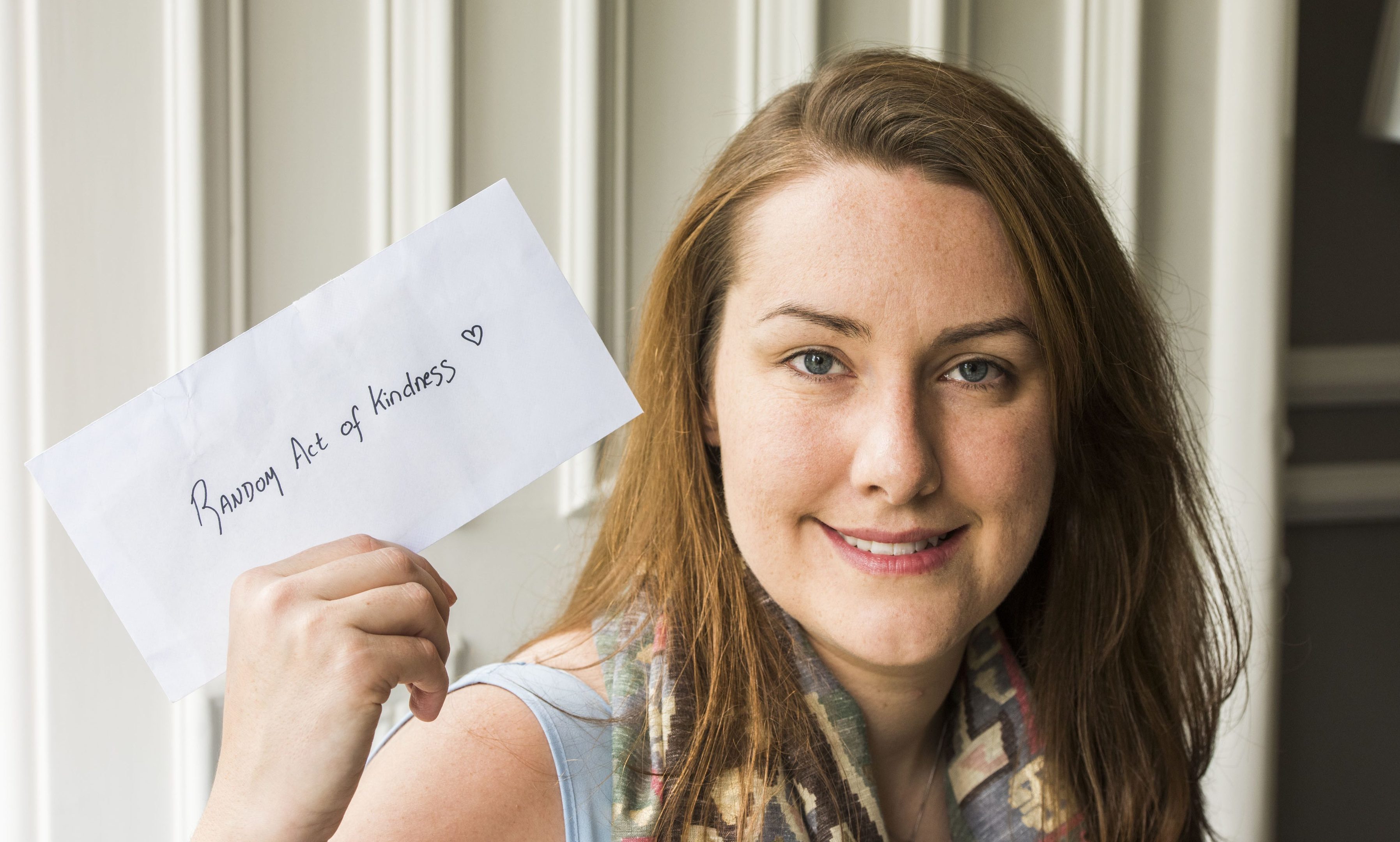 Emma Storrar with the envelope from Fiona Munro