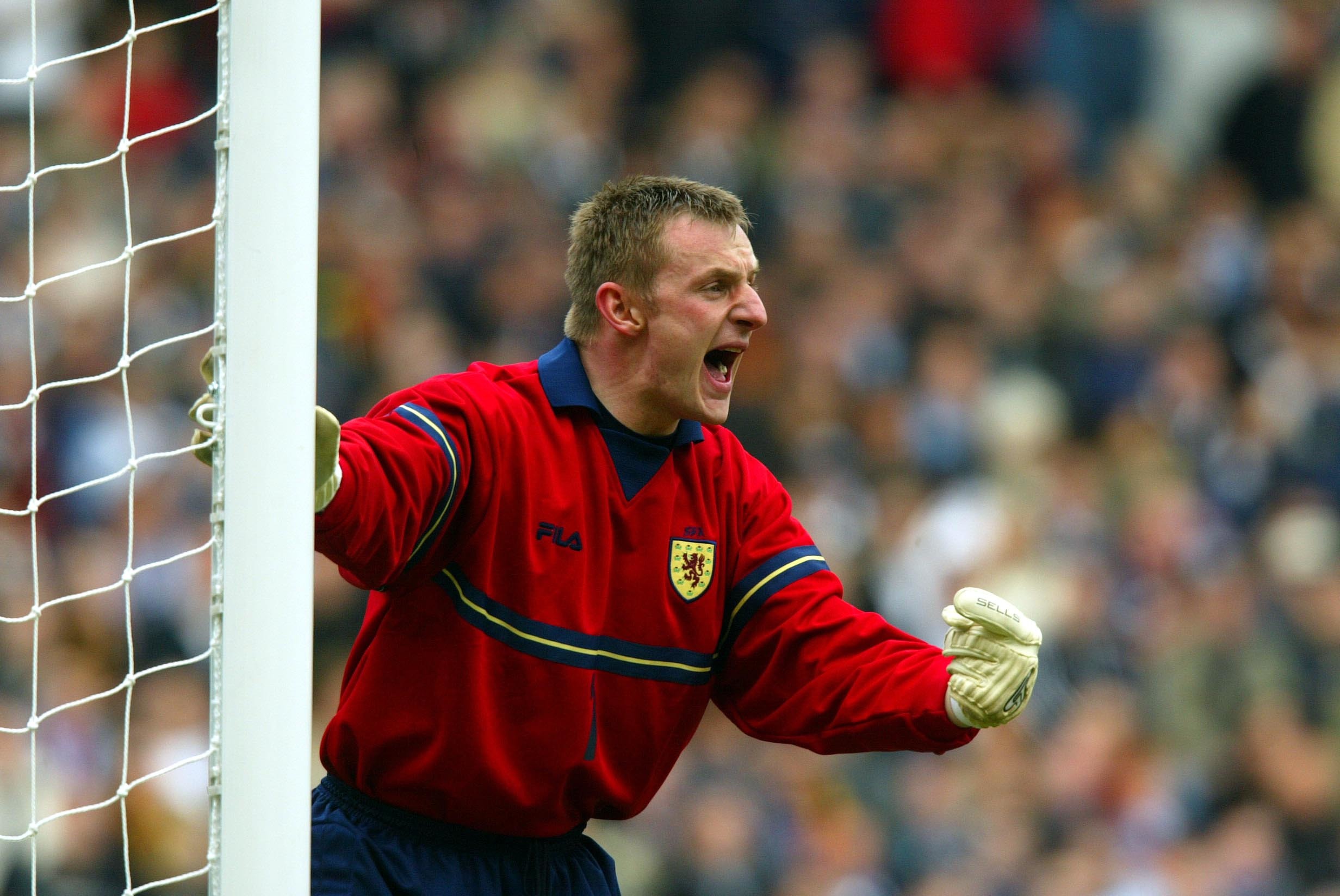 Rab Douglas in action for Scotland.