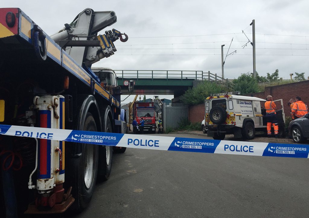 Emergency services at the scene where five men died after a wall collapsed at a Hawkeswood Metal recycling plant in Aston Church Road, Birmingham. PRESS ASSOCIATION Photo. Picture date: Thursday July 7, 2016. Police said all five victims were pronounced dead at the scene. See PA story ACCIDENT Recycling. Photo credit should read: Richard Vernalls/PA Wire