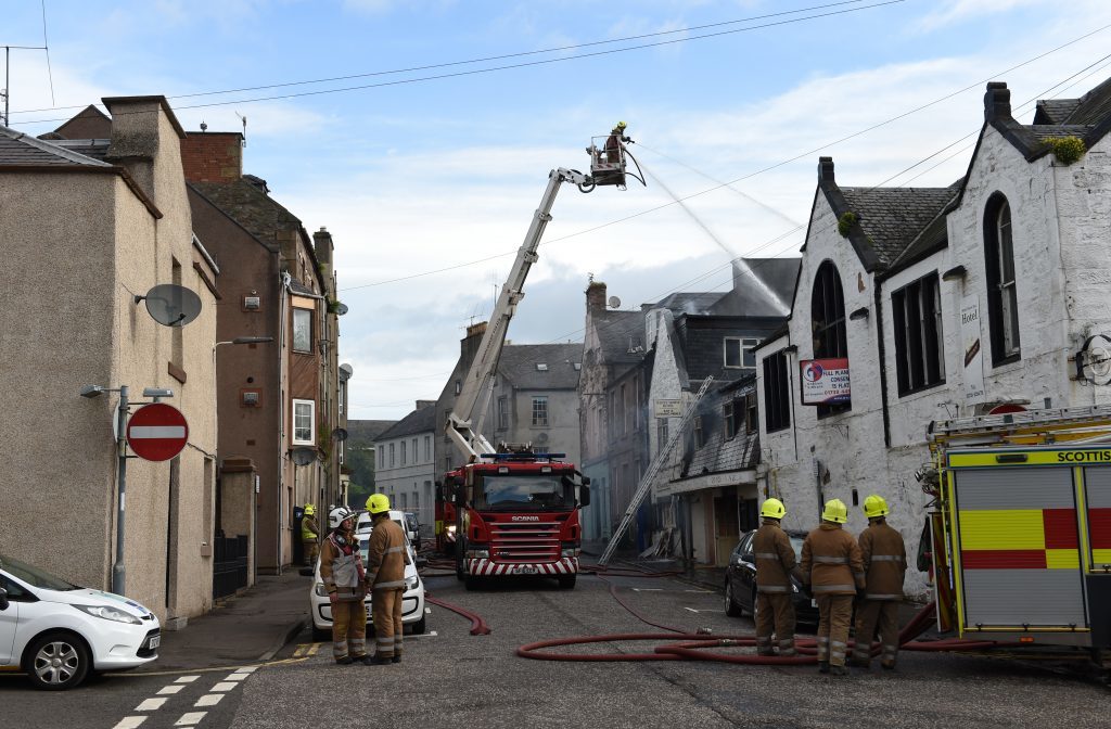 Firefighters at scene of White Horse Inn fire, in Perth, in 2016
