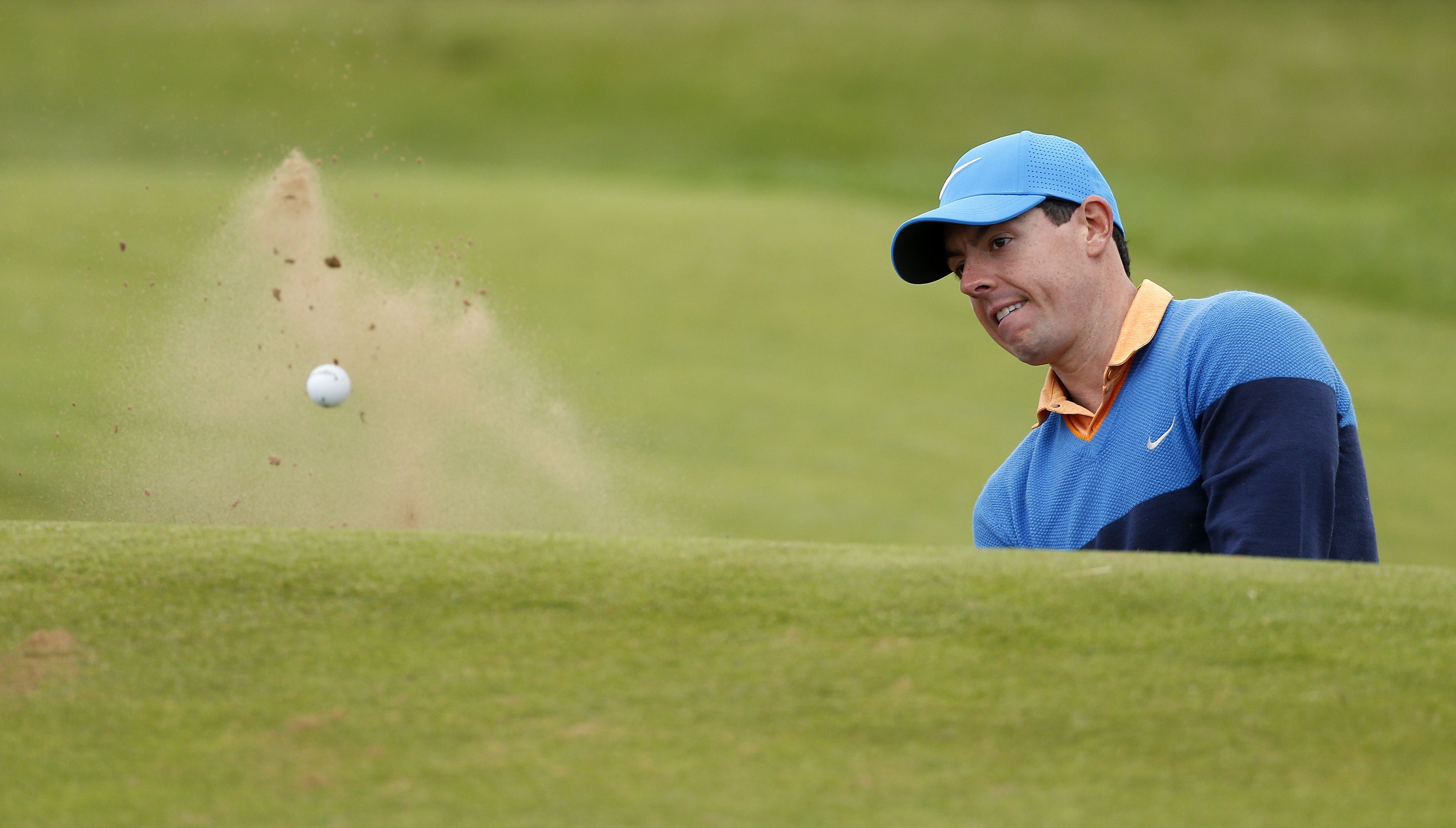 Rory McIlroy escapes a bunker at the fifth during yesterday's practice round at Royal Troon.