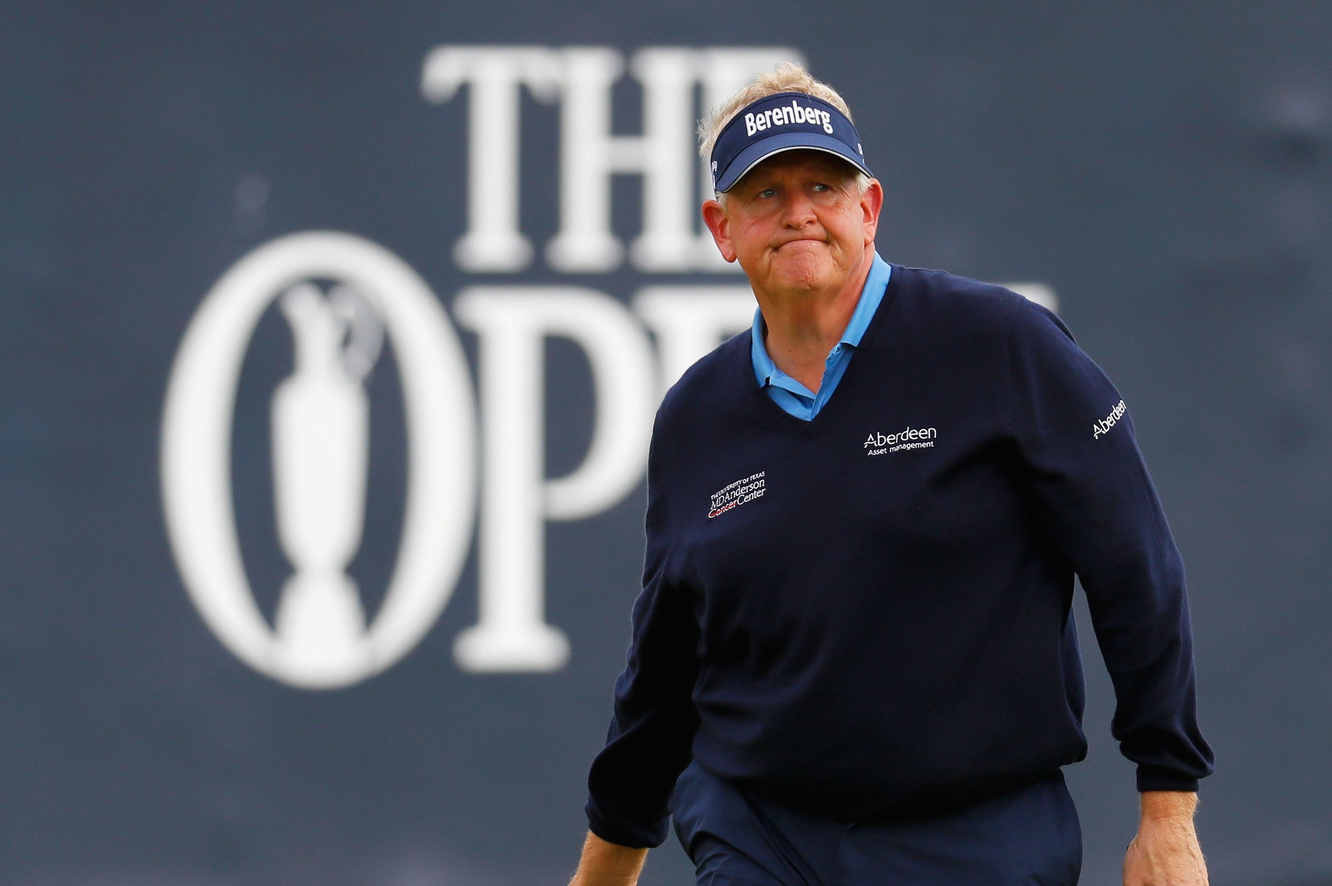 Colin Montgomerie reacts on the 18th green after playing what he thought was his last shot of The Open.