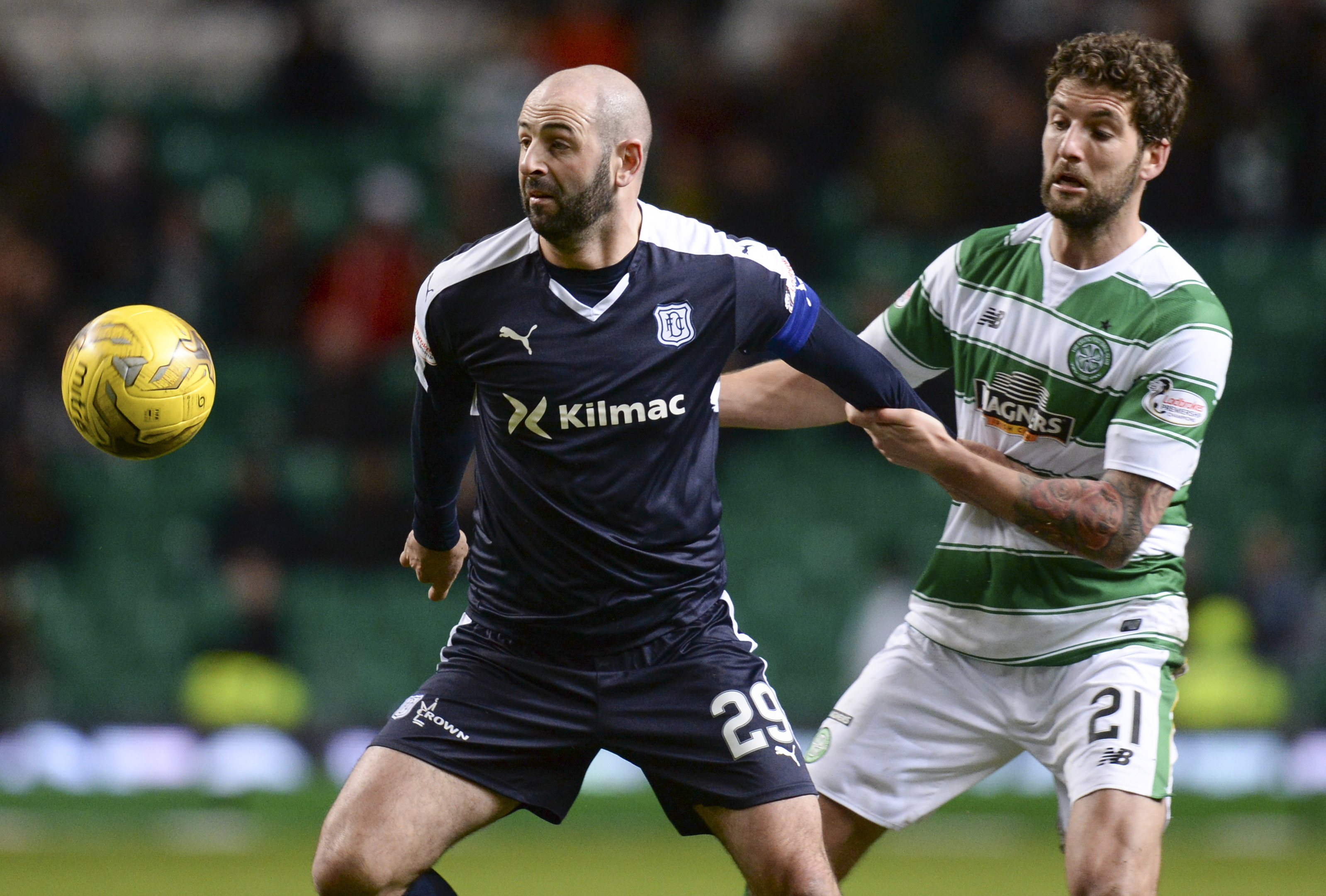 Gary Harkins in action for Dundee.