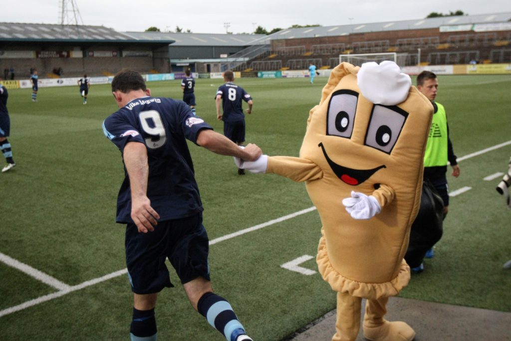 Baxter the Bridie gives the players pre-match moral support.