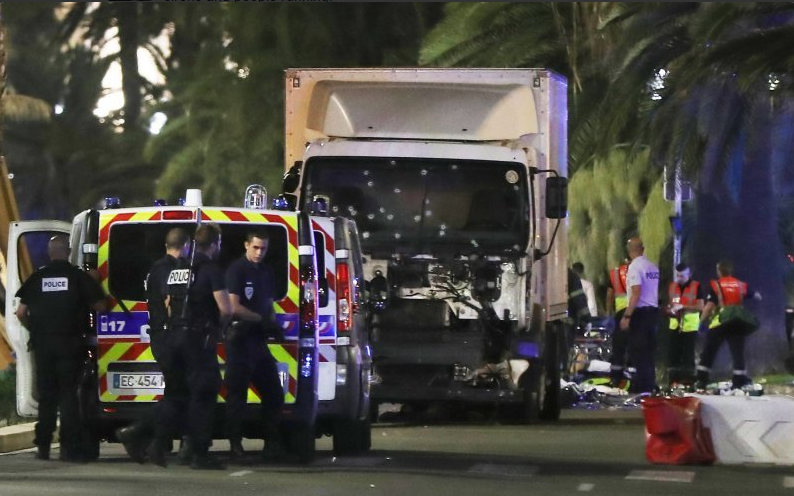 The lorry in Nice with bullet holes in the windscreen.