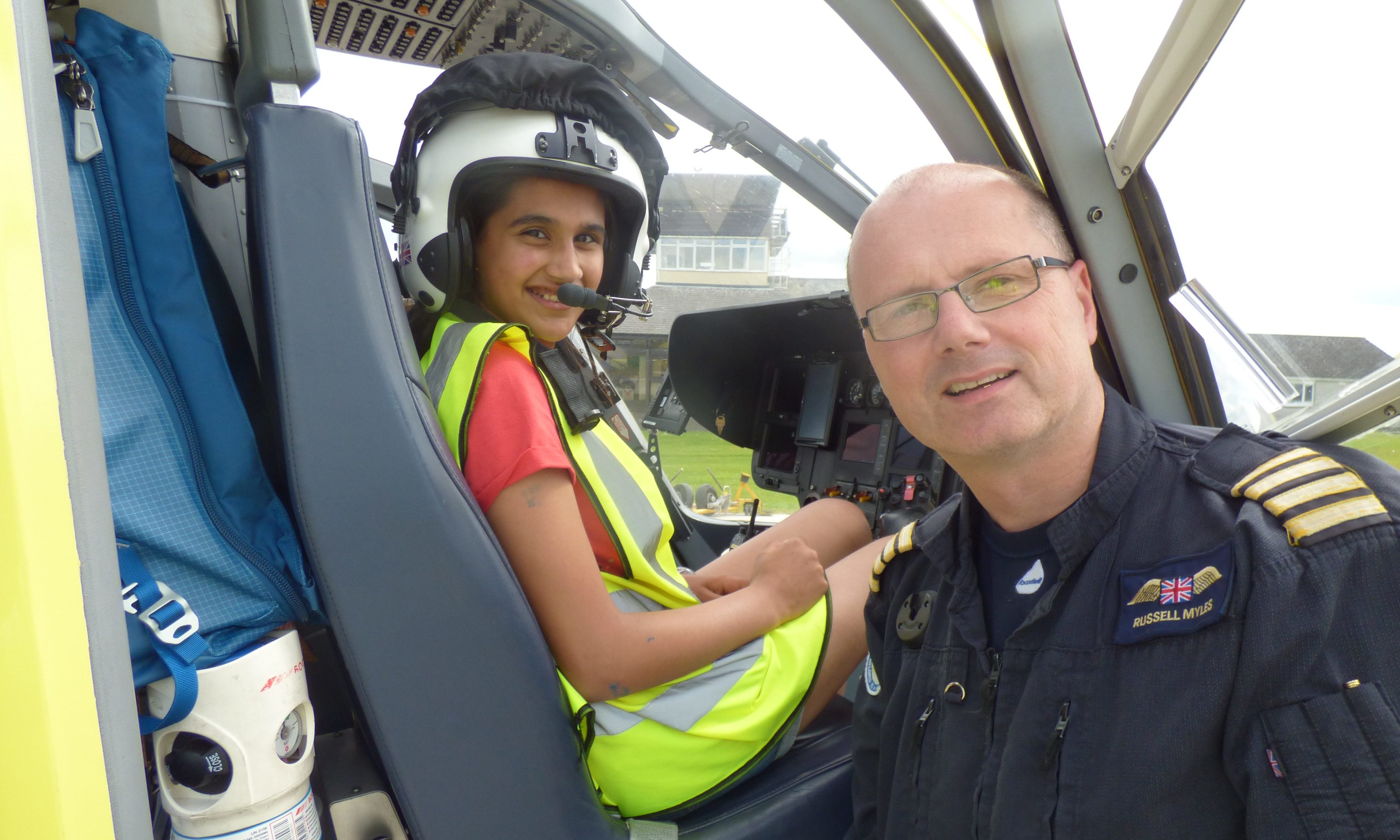 Sahar with SCAA senior pilot Captain Russell Myles.