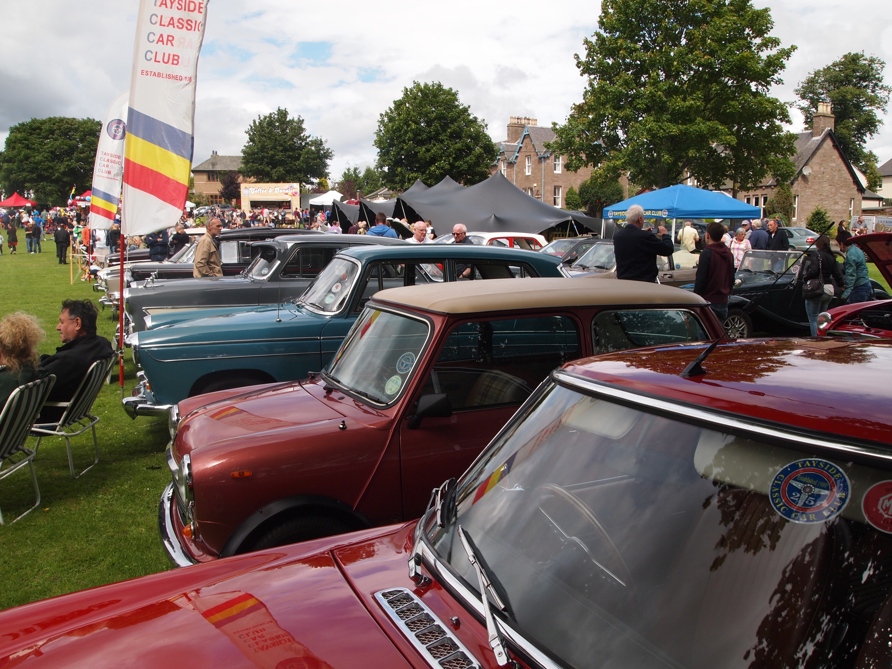 A variety of classic cars on display.