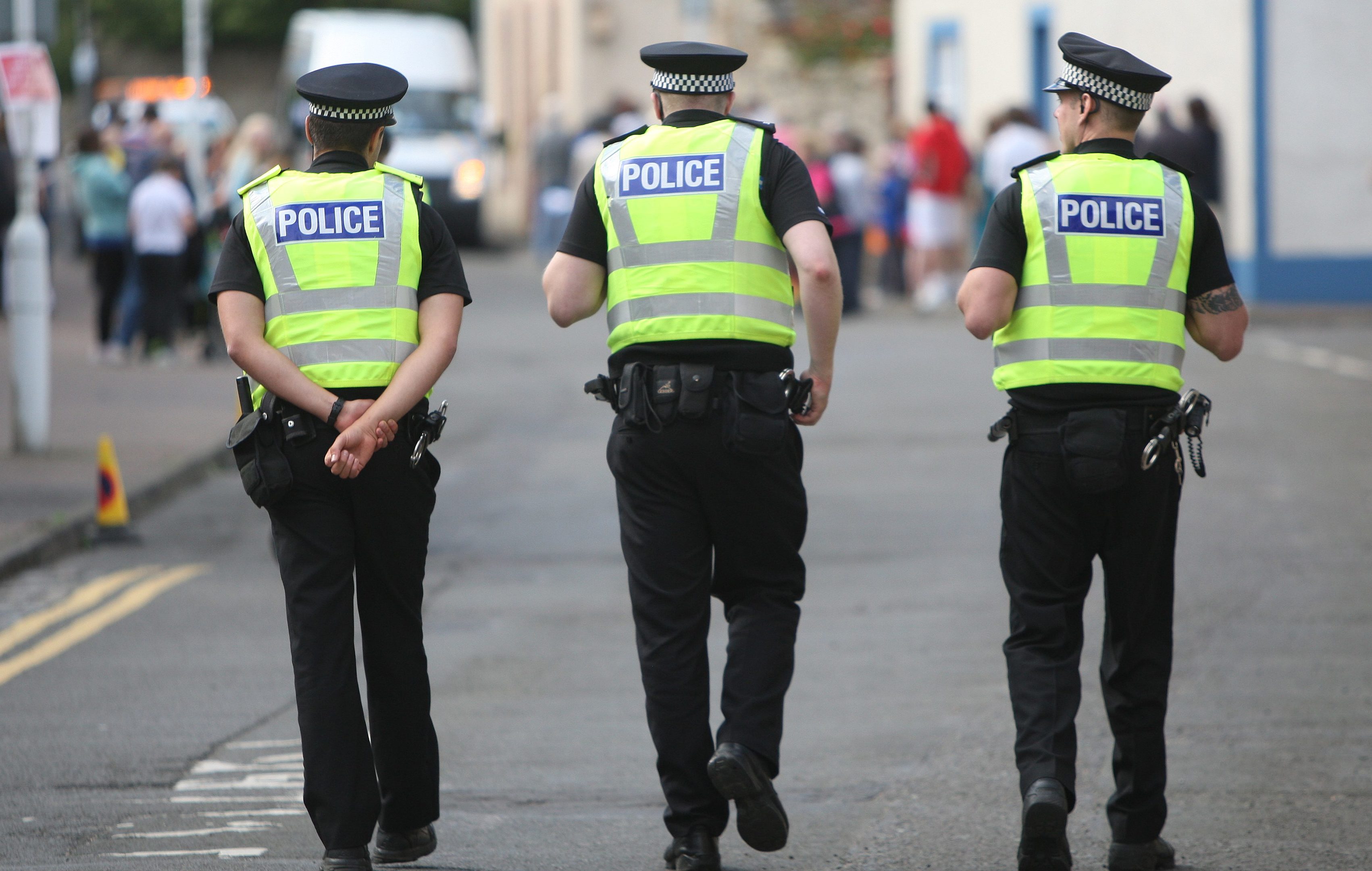 Police officers on the streets of Pittenweem in the East Neuk.