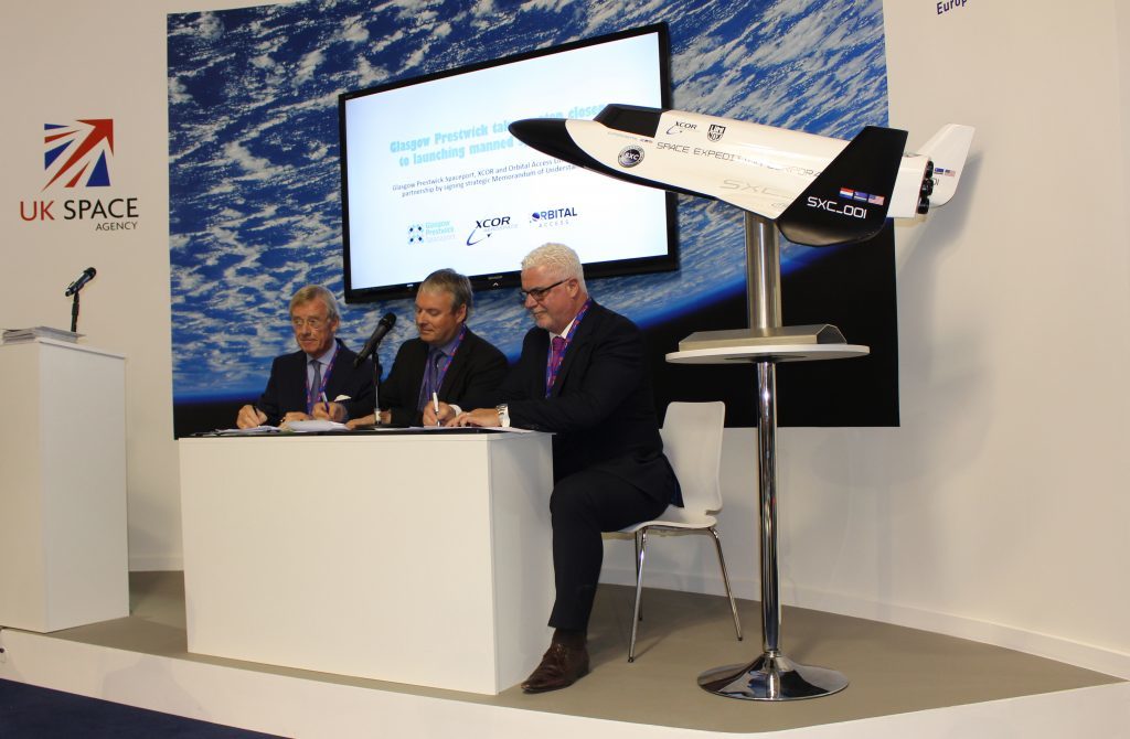 Strategic adviser Bem Droste, Stuart McInytre, Orbital Access CEO, and Mike Stewart, business development director at Glasgow Prestwick Spaceport, signing the memorandum of understanding.