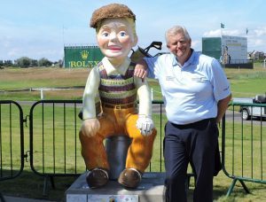 Colin Montgomerie with the Oor Wullie statue at Carnoustie links.