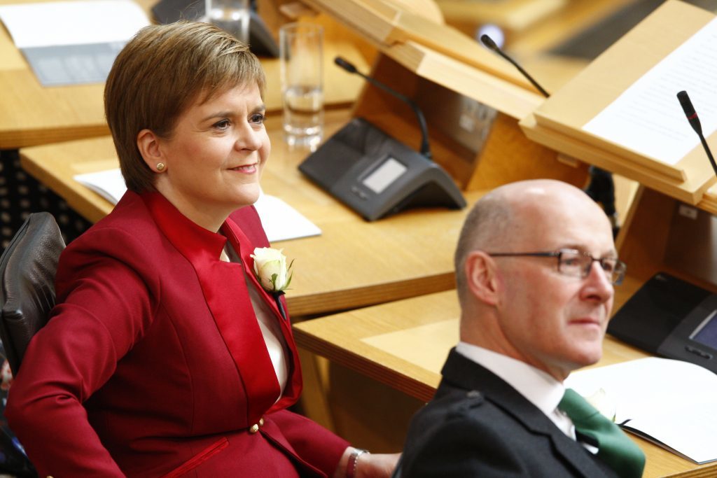 First Minister Nicola Sturgeon has accused the UK government of "playing games" over Trident.