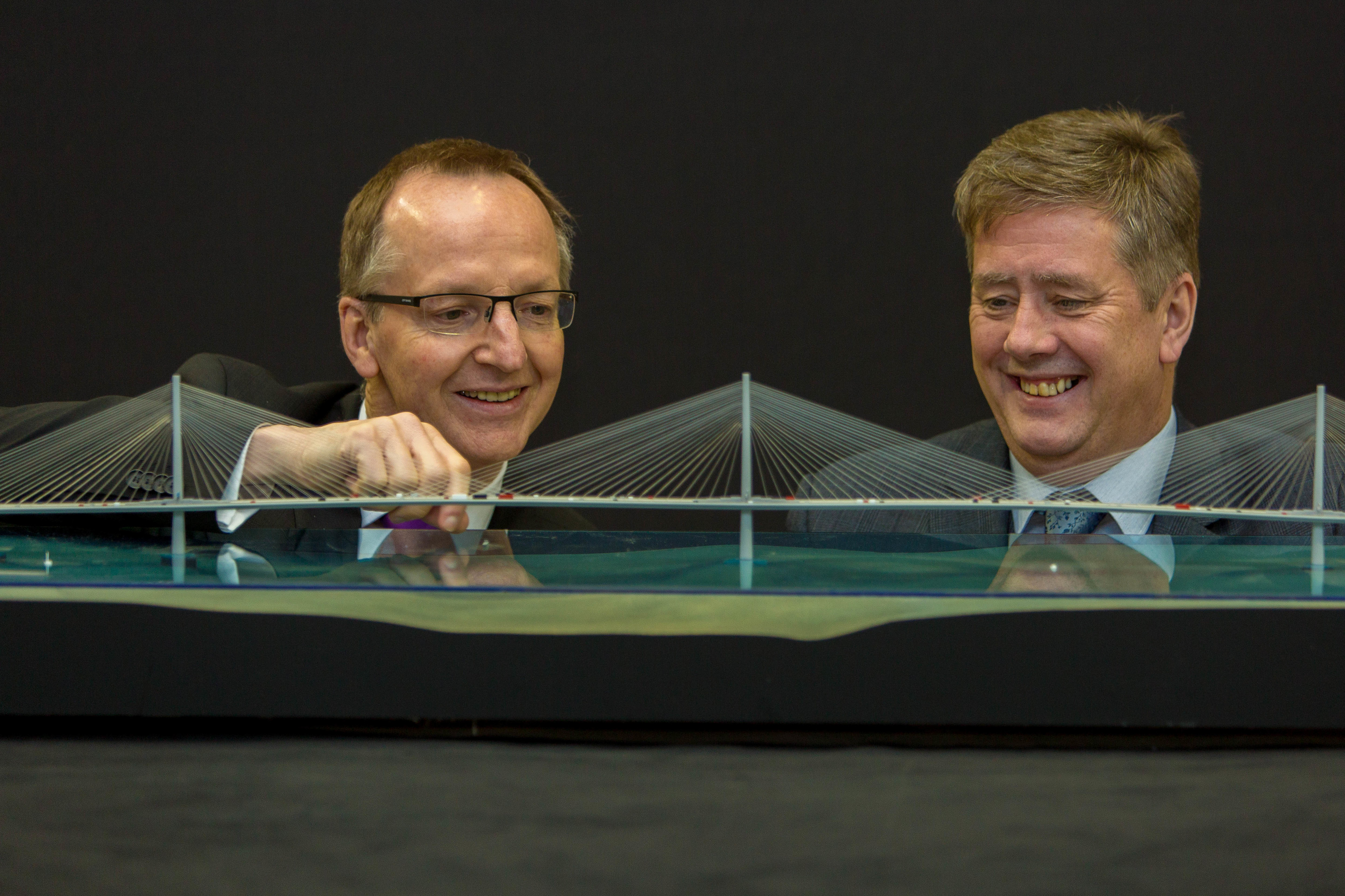 Minister Keith Brown is shown the model of the new Queensferry Crossing at National Museums Collections Centre in Edinburgh by Dr Gordon Rintoul