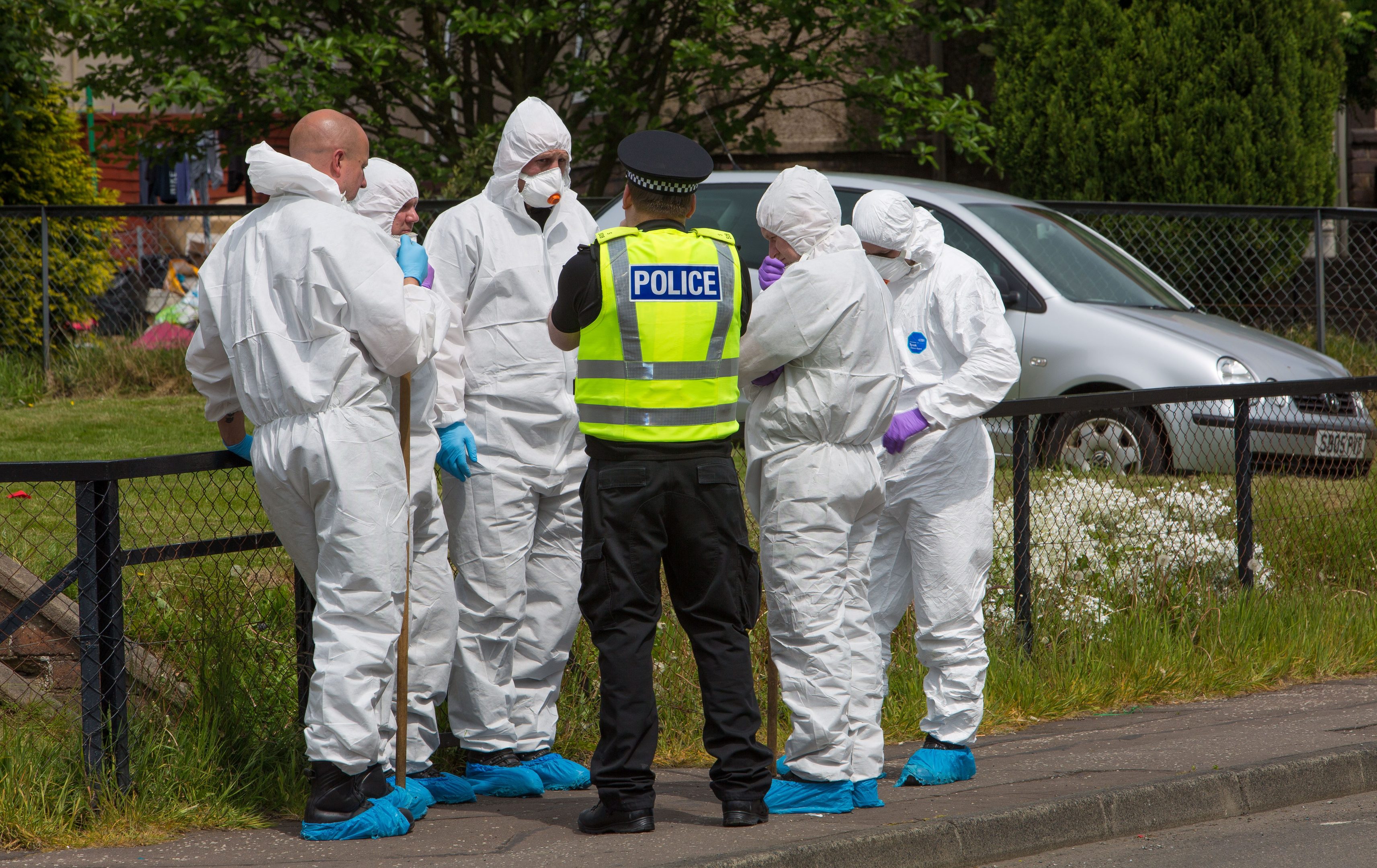 Forensic officers were prominent in the initial searches around Tweed Avenue in Kirkcaldy where Darren Adie was discovered.