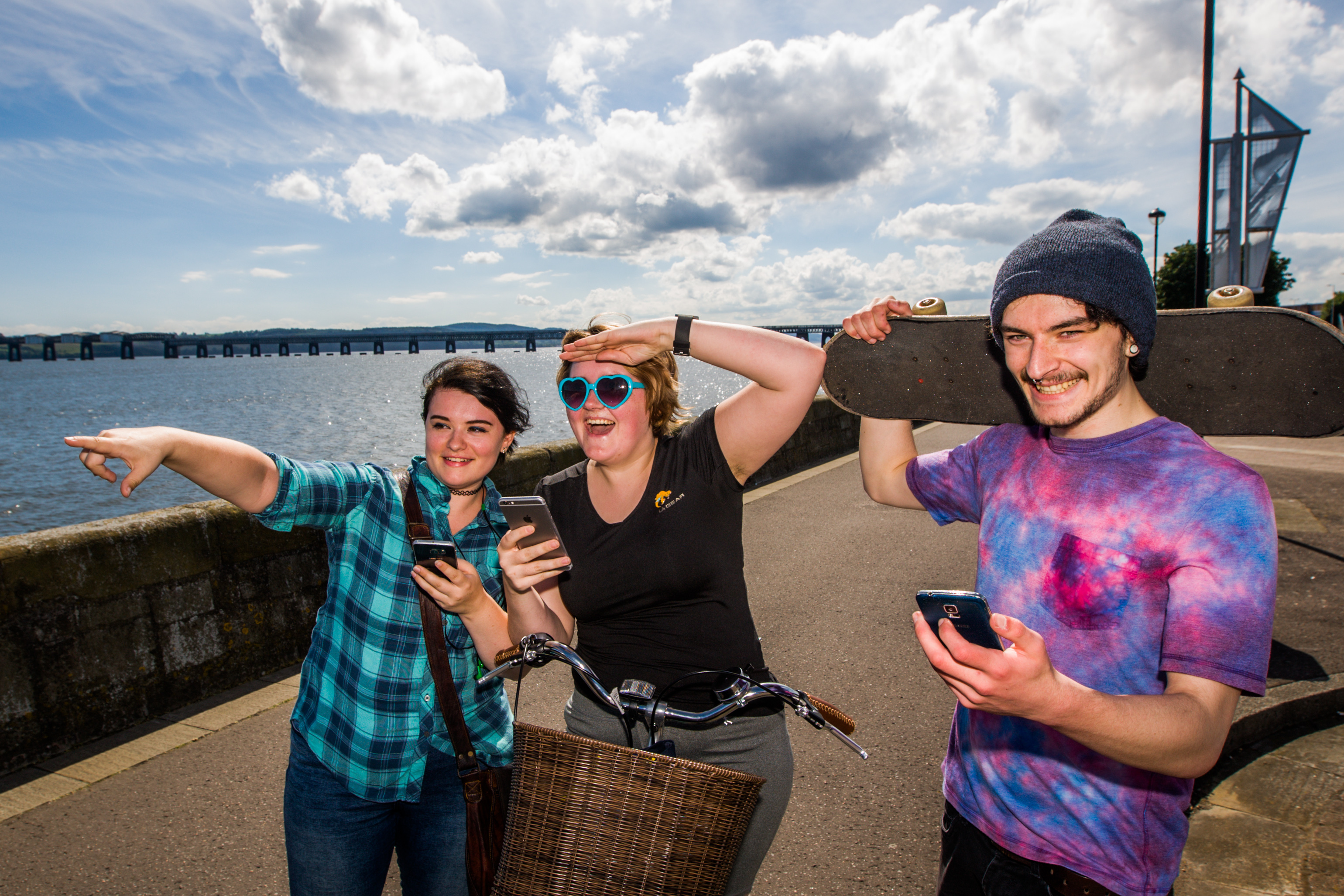 Dundonians have been chasing Pokemon all over the city since the launch of Pokemon Go. Picture shows left to right, Sarah Sharkie, Keilidh Bradley and Fergus Russell (both studying Animation at DJCAD) playing the Pokemon Go app on their phones at Riverside Dundee.