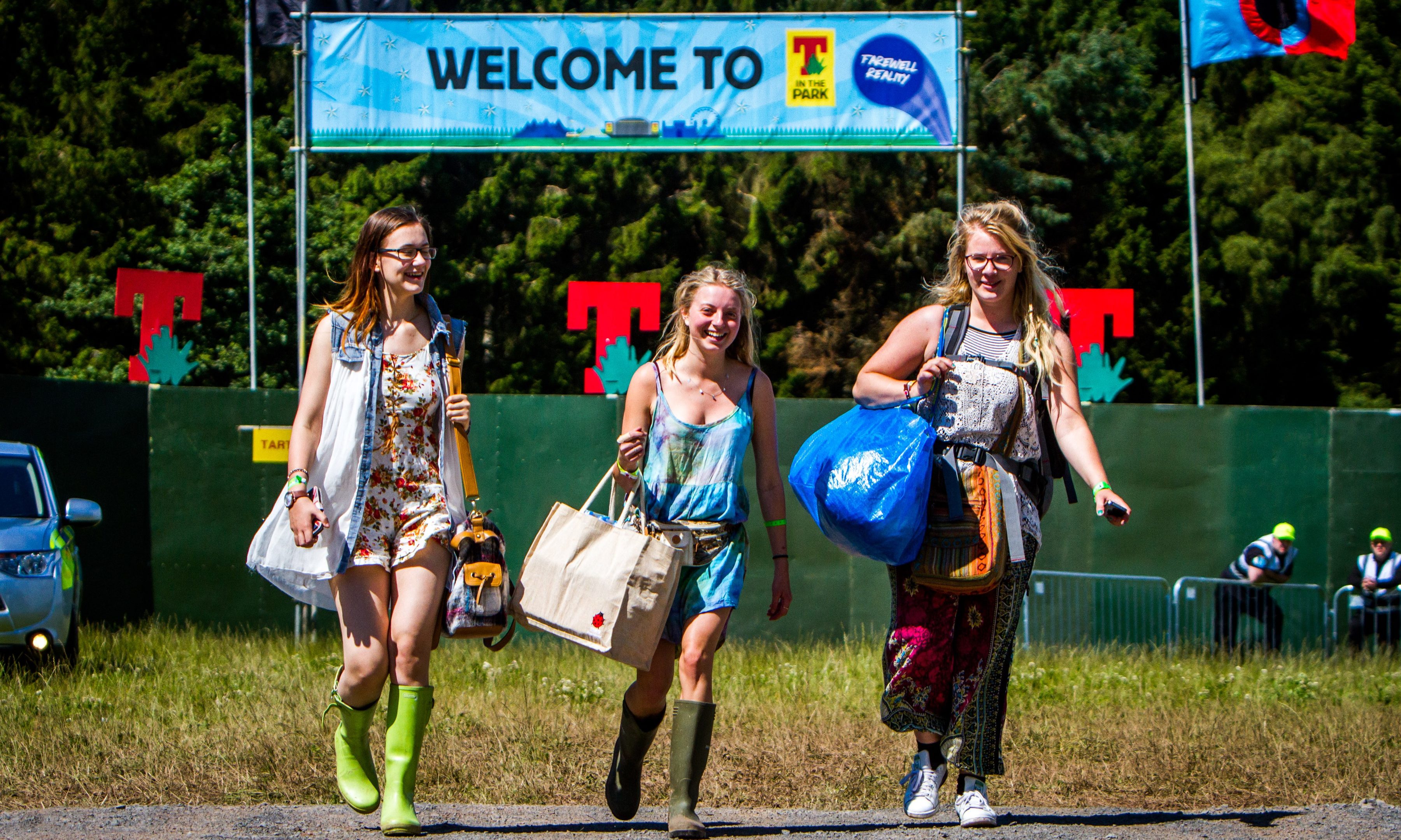 Three festival-goers arrive at the campsite for this year's T in the Park.