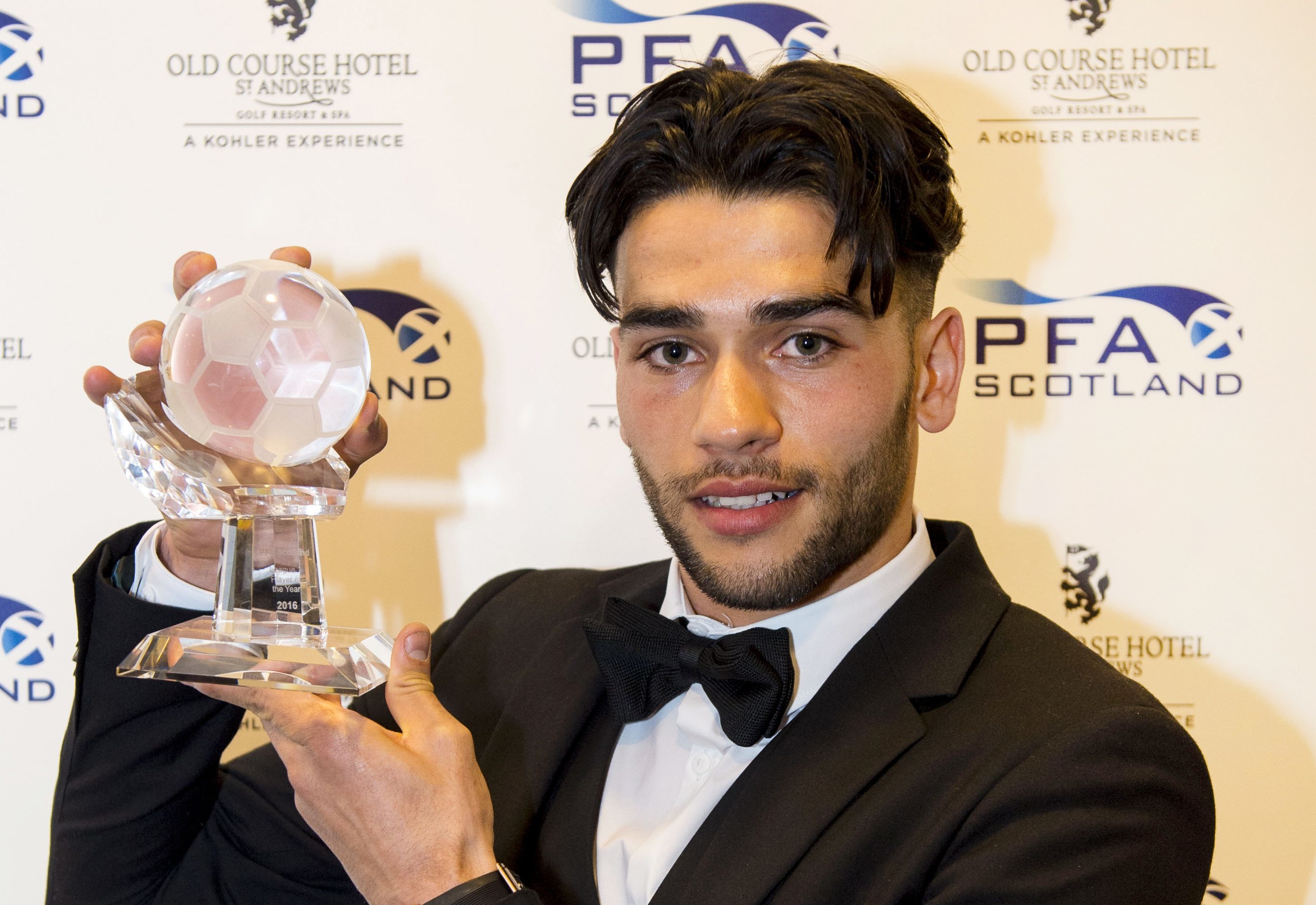 Faissal El Bakhtoui with his League One Player of the Year award.