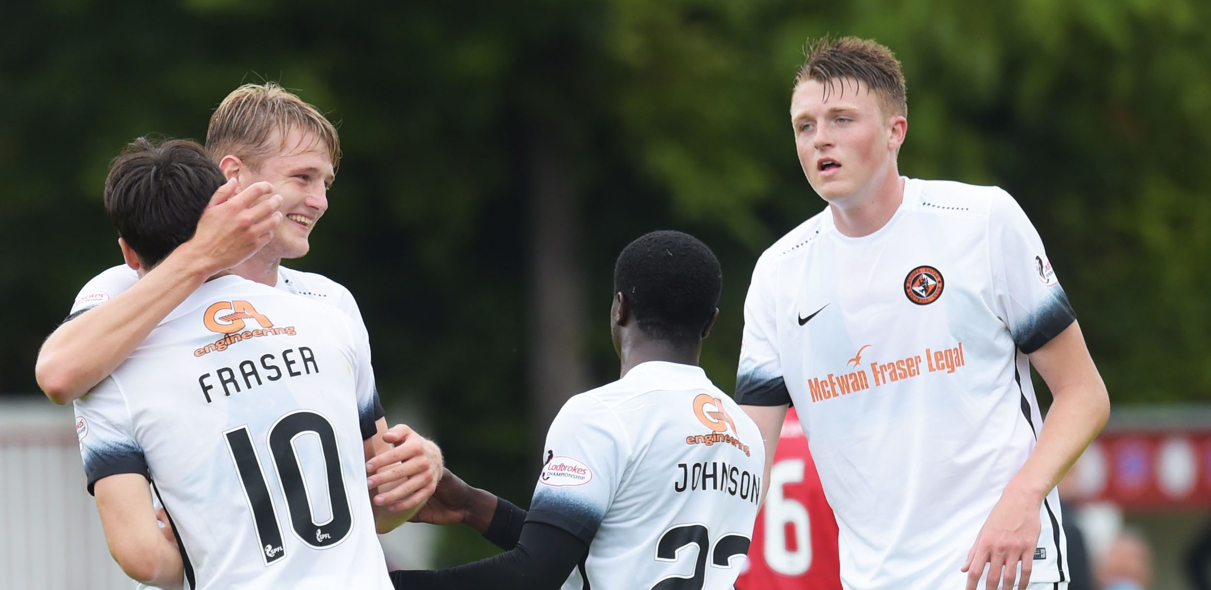 The United players celebrate Scott Frasers second goal.