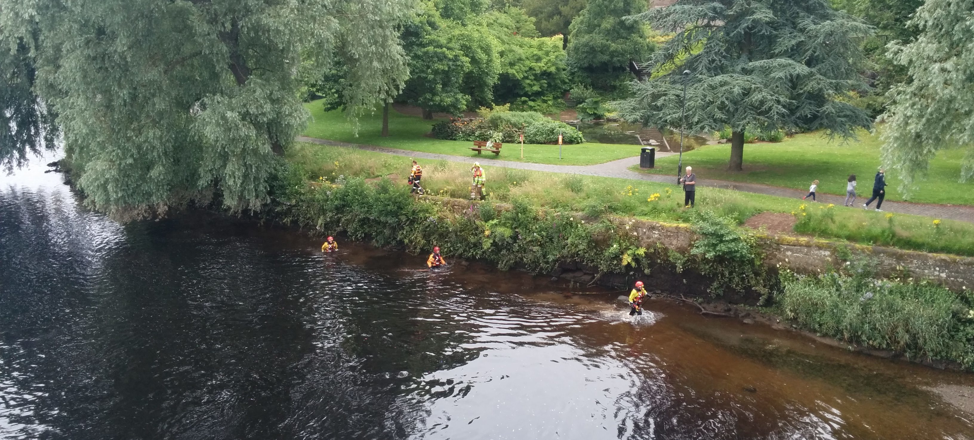 Firecrew search the banks of the River Tay in Perth.