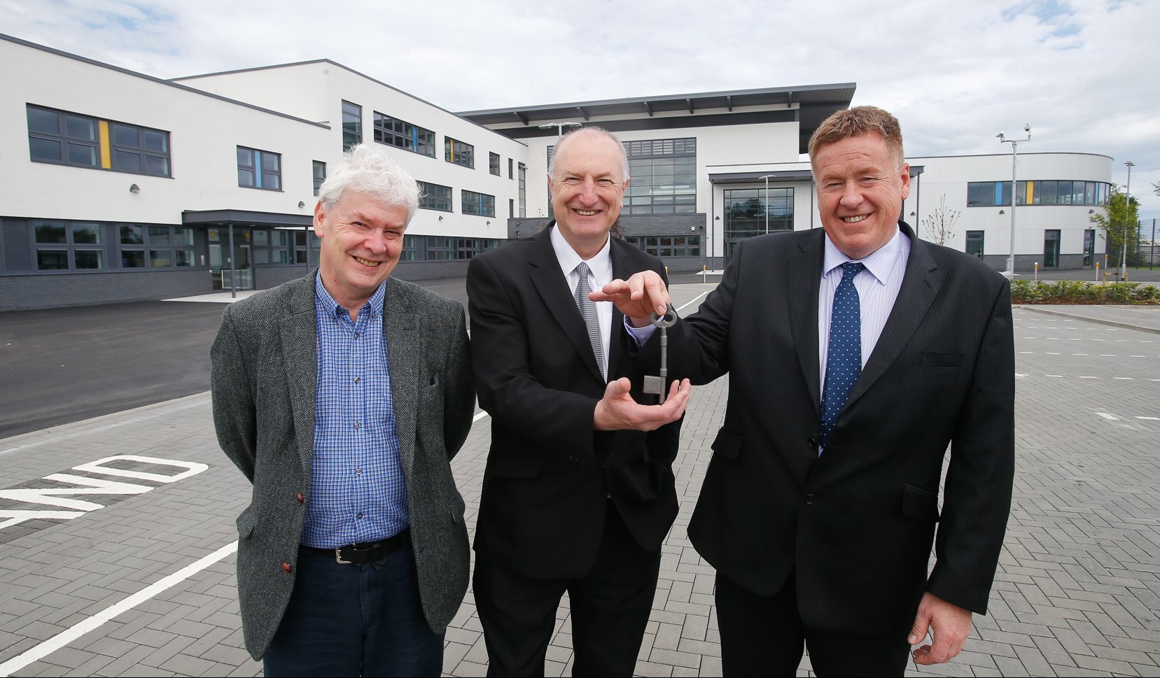 Councillor Bryan Poole, education spokesperson, Councillor Neil Crooks, Kirkcaldy area committee chair, and Martin Cooper from BAM Construction outside the new Windmill Campus in Kirkcaldy, where Viewforth High School will be based.