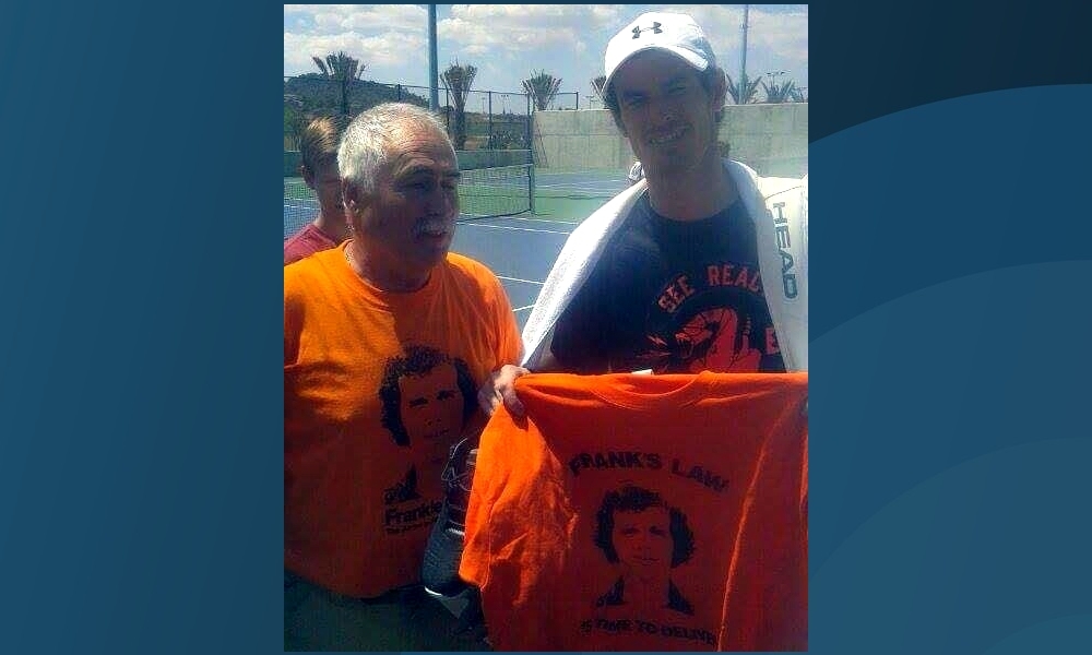 Andy Murray holds a Frank's Law T-shirt with pride.